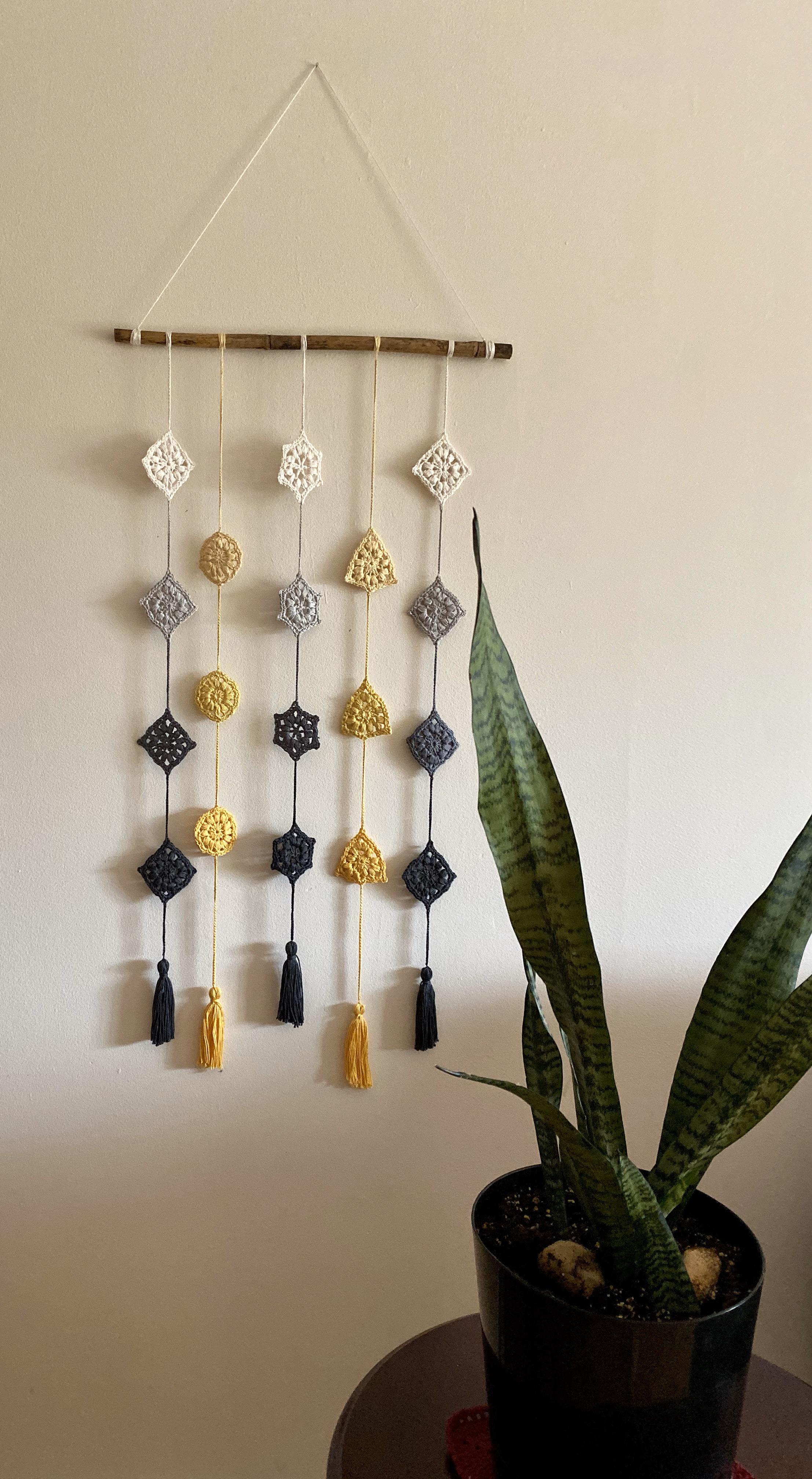 Pretty wall decor made by my mom ) r/crochet