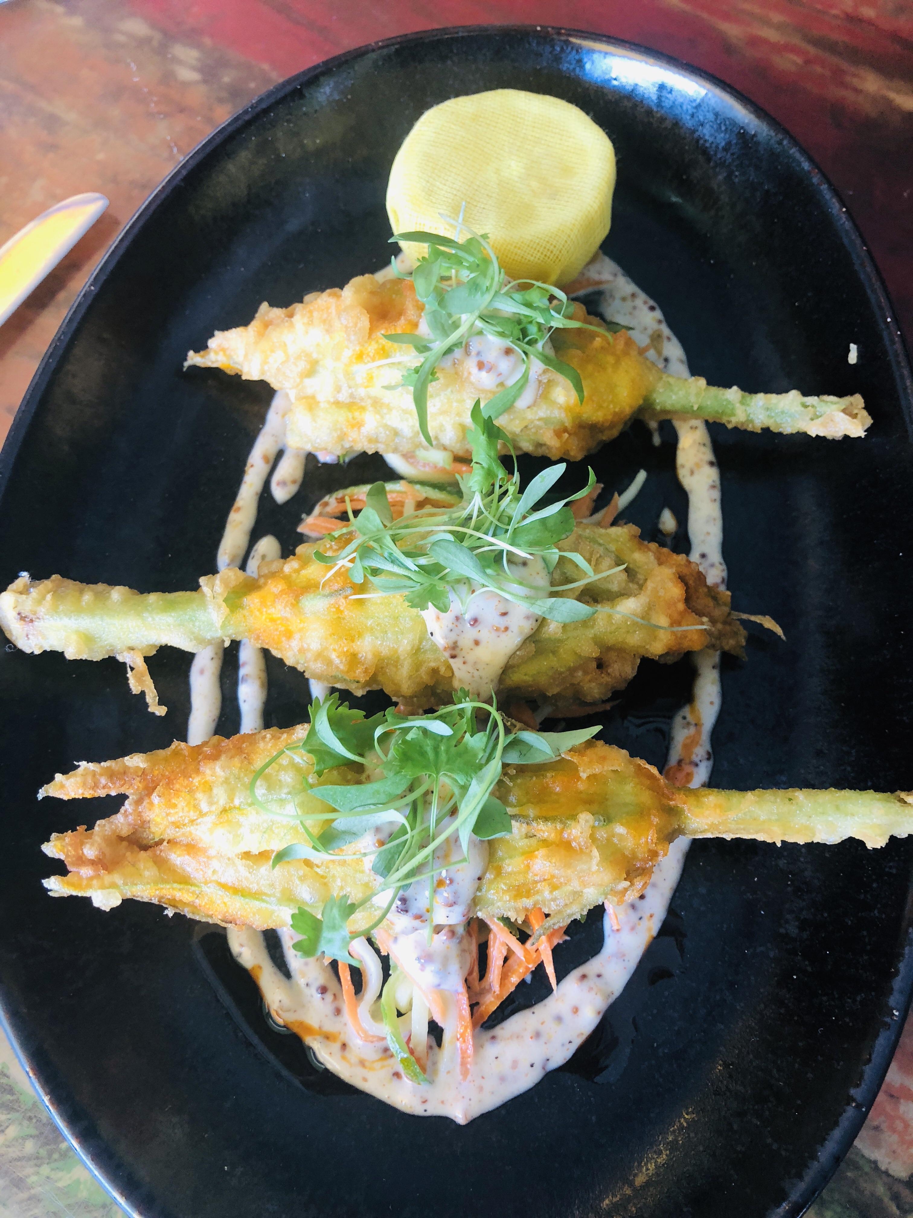 I made deviled crab stuffed zucchini blossoms with “blackened” mustard