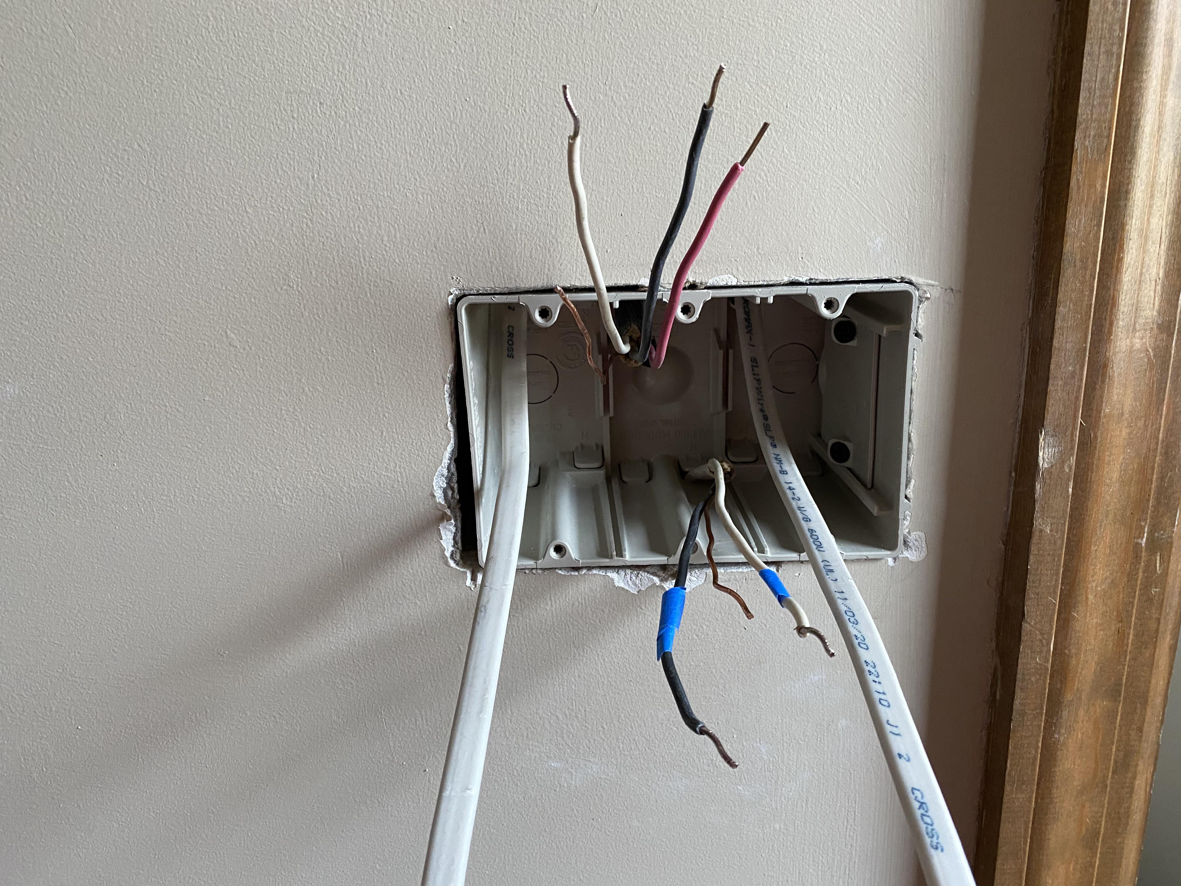 Red wire is NOT 3 way, but load at light fixture. Blue tape is line