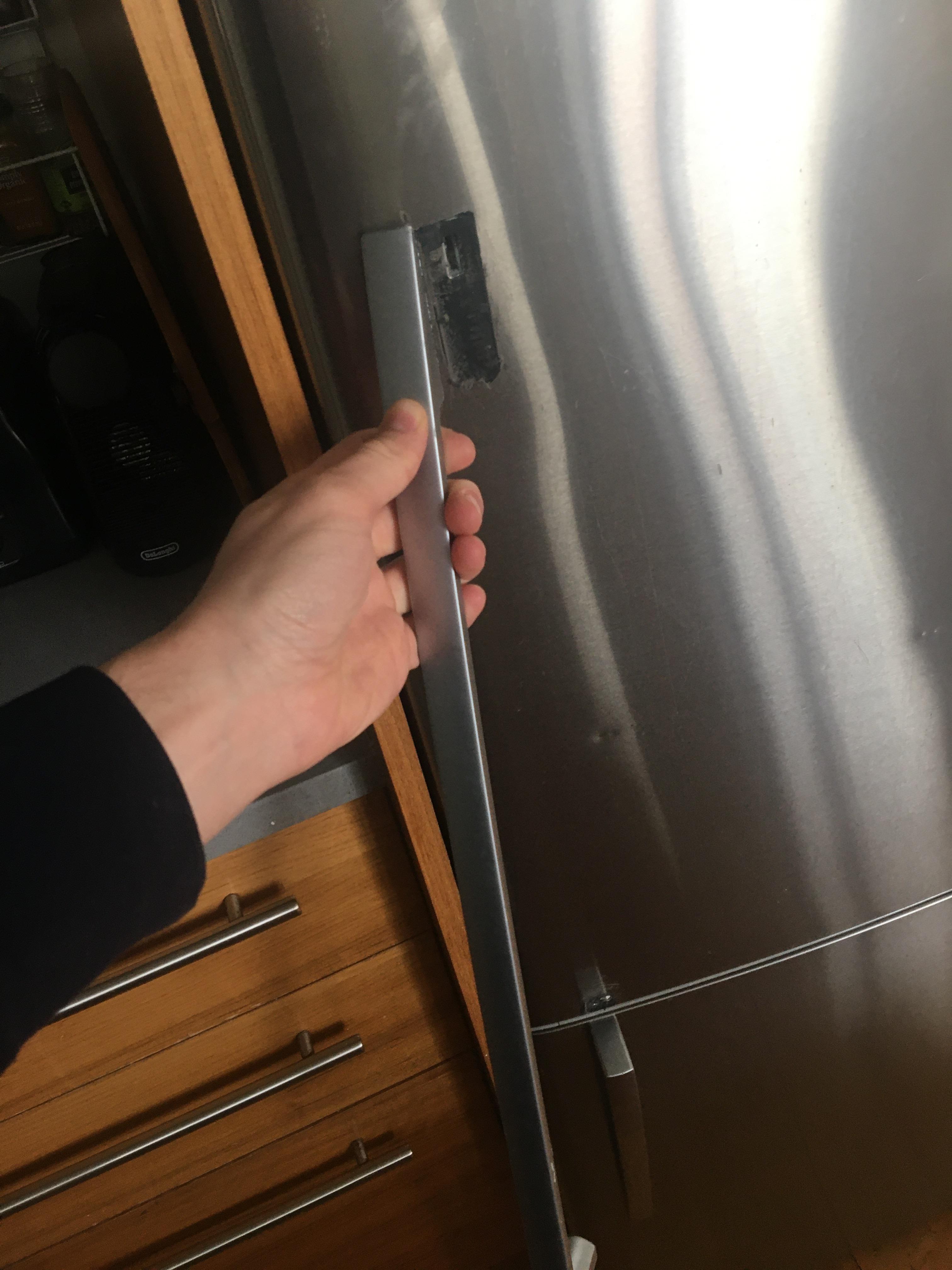 How can I glue my fridge door handle back? I have tried JB weld with a