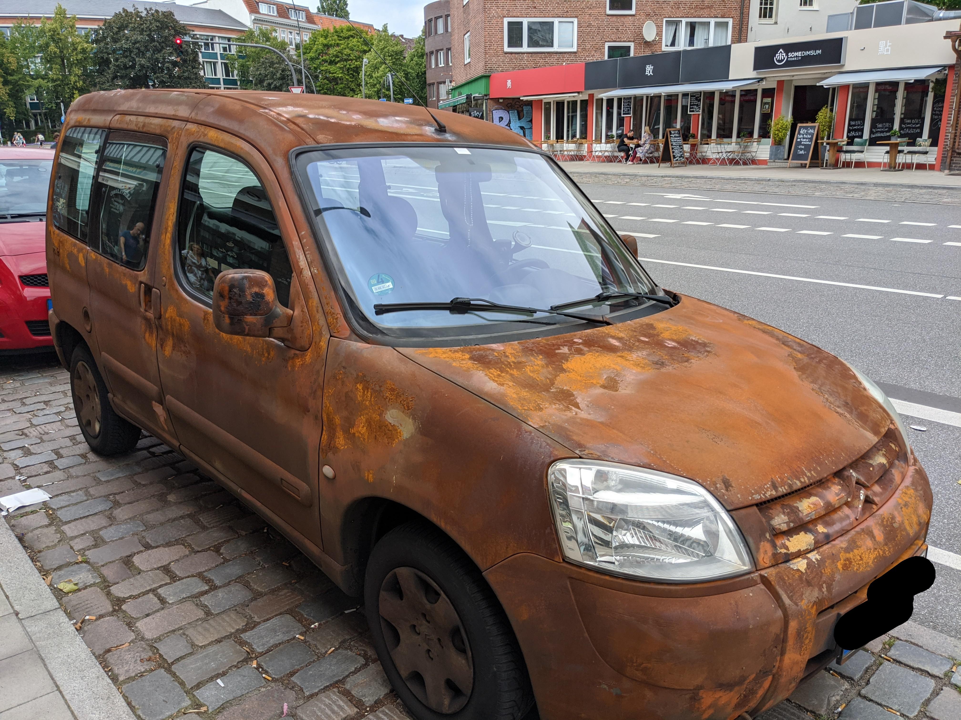 This rusty paint job on a brand new car [OC] r/mildlyinteresting