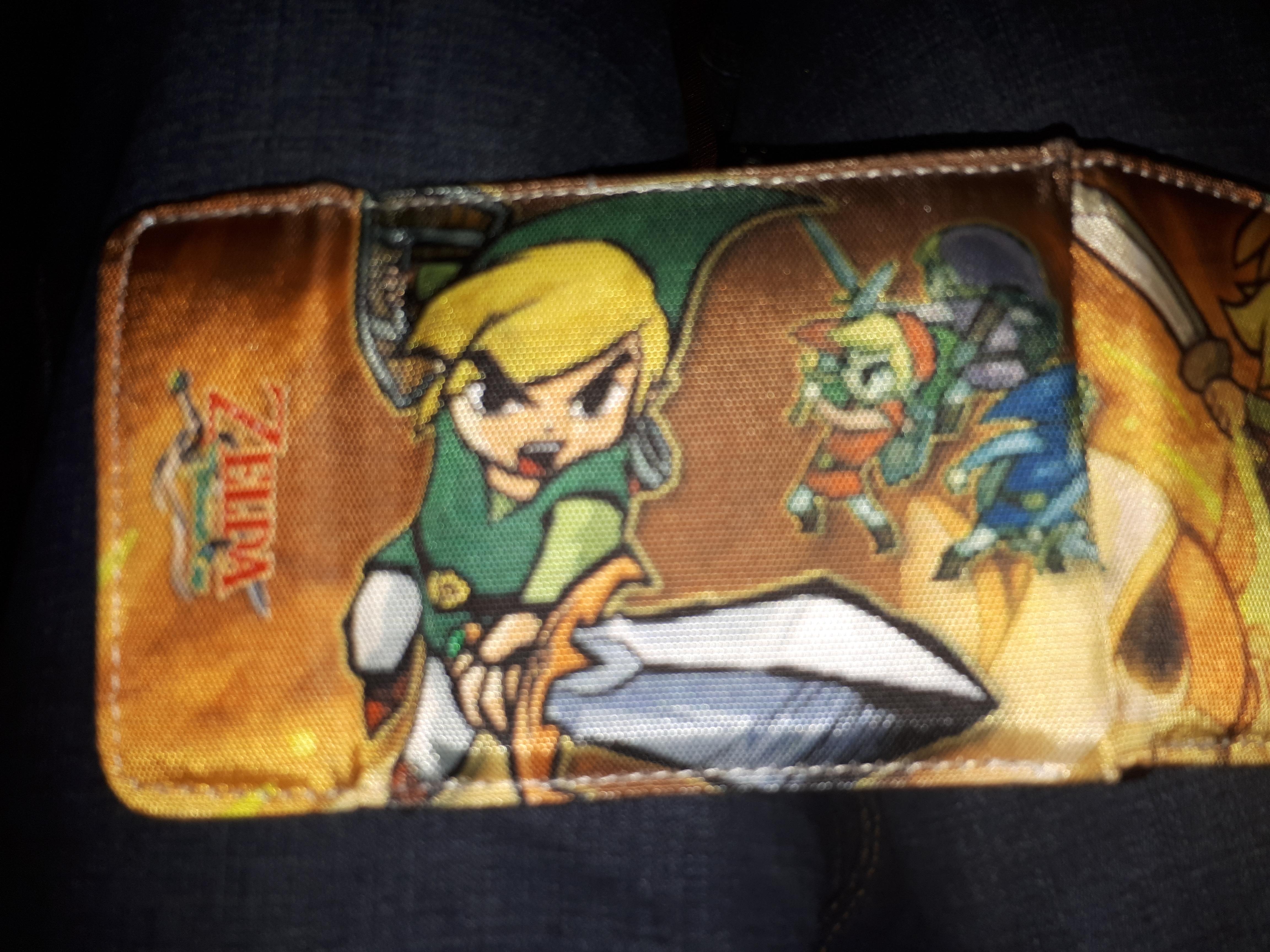 My wallet says "The minish cap" but they have "Four swords" on it r