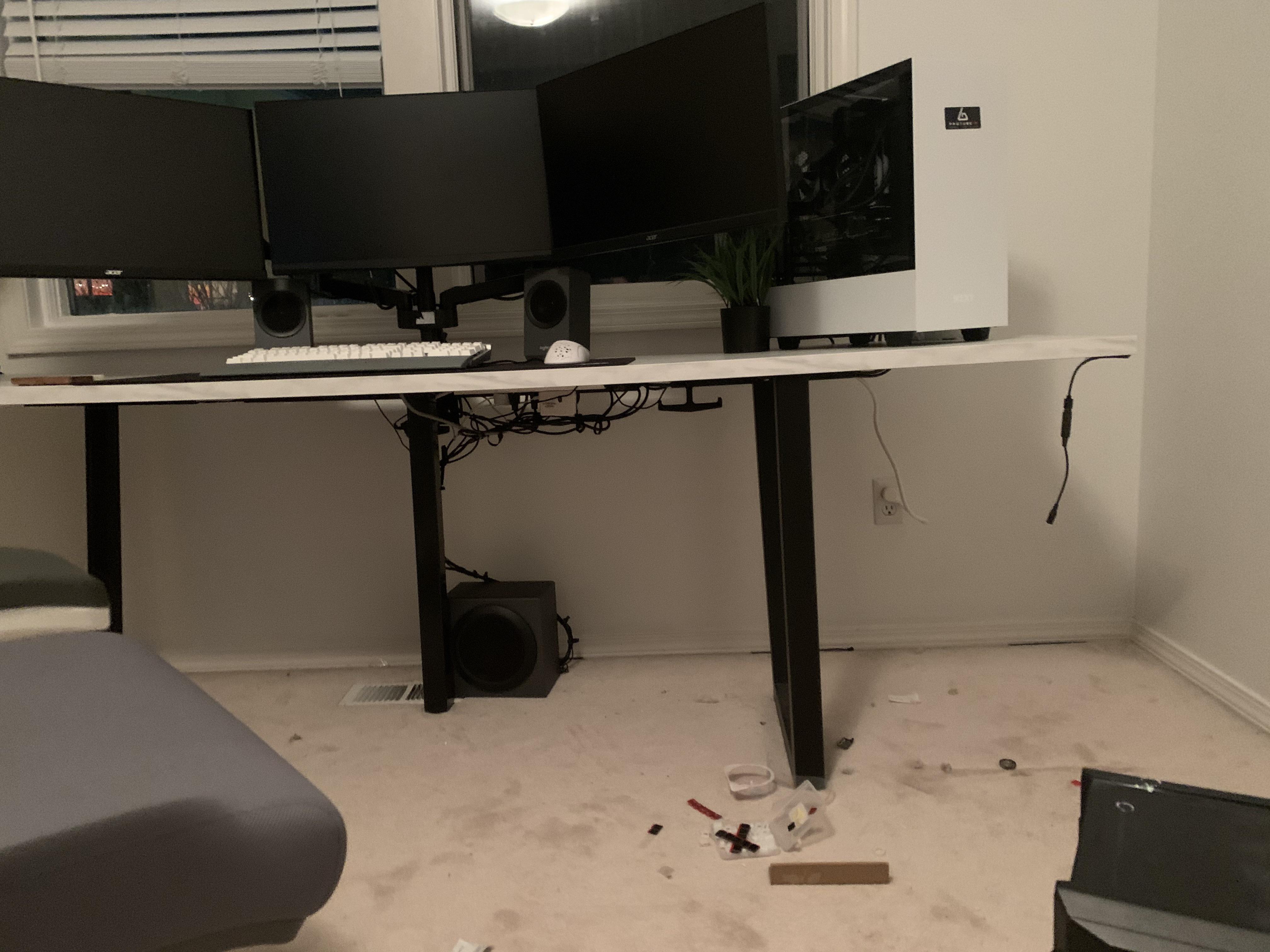 My floor isn’t level and is causing my desk to bend (I know it’s the