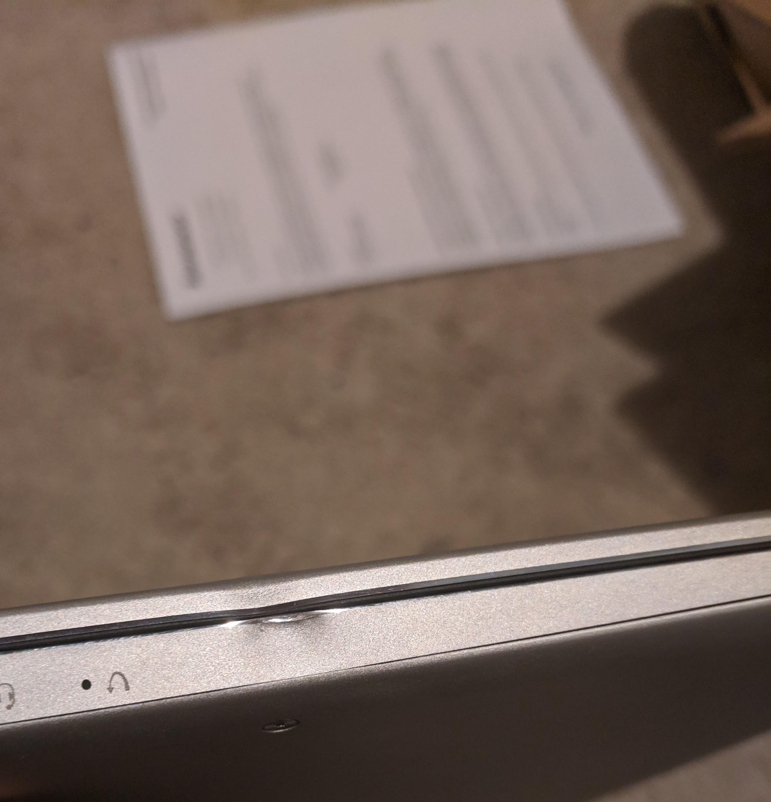 RMA device returned with damage. Lenovo refuses to guarantee coverage