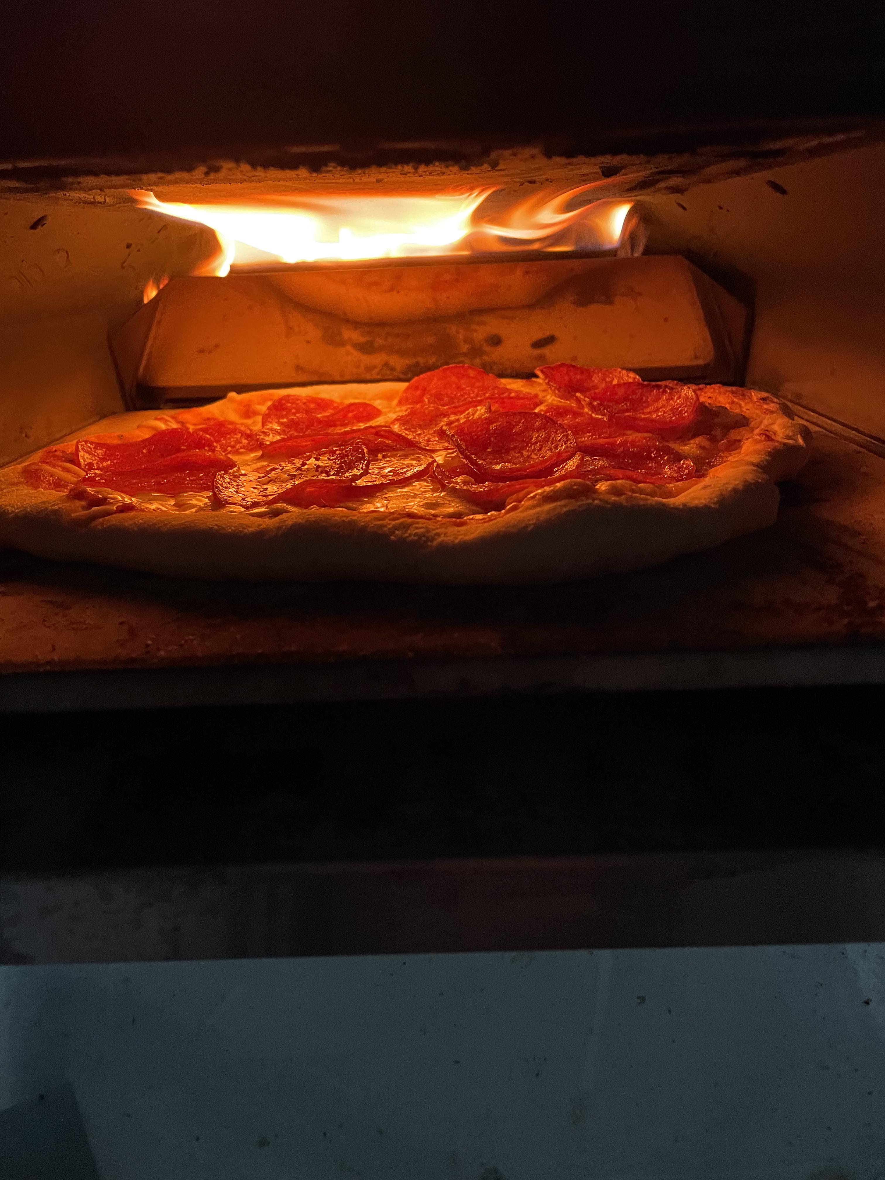 First time using my pizza oven with home made dough. r/Pizza