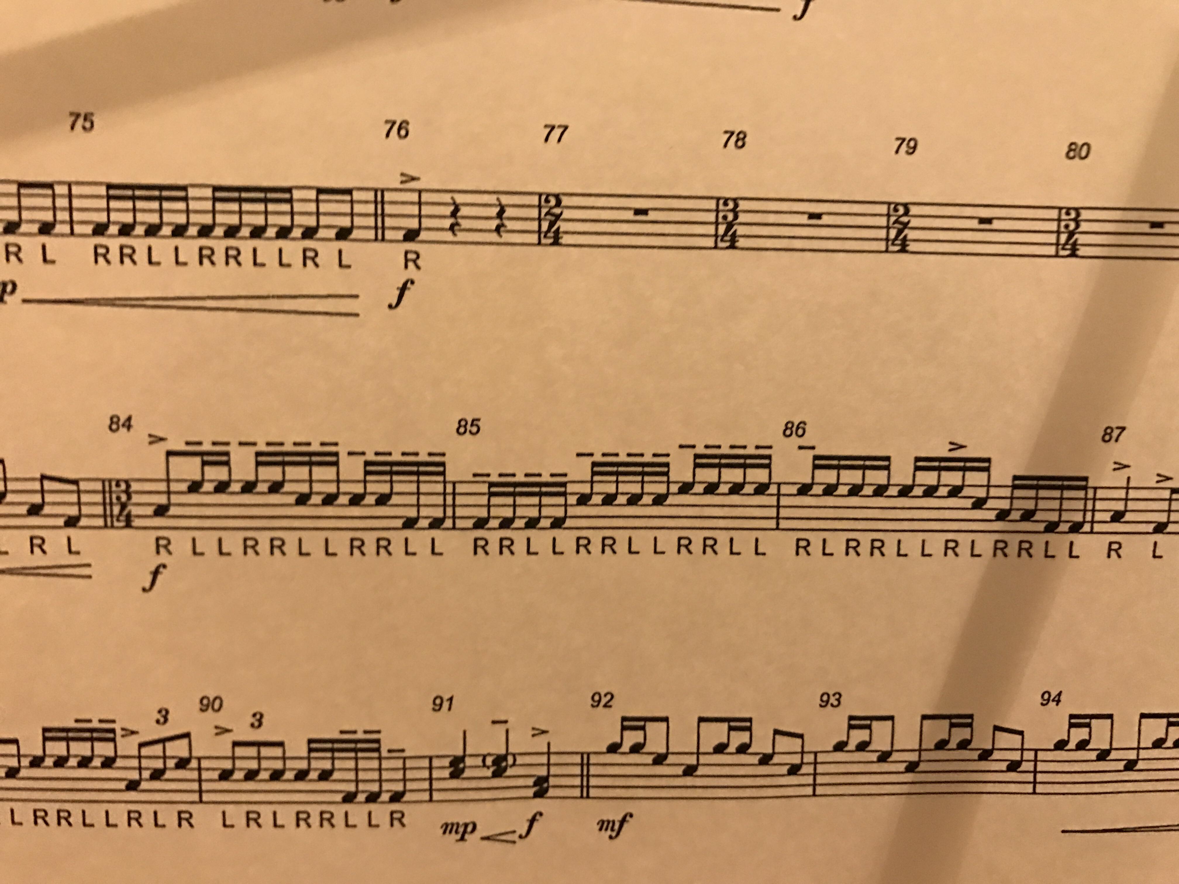What do these legato symbols mean on this tenor music? (8485) r/drumline