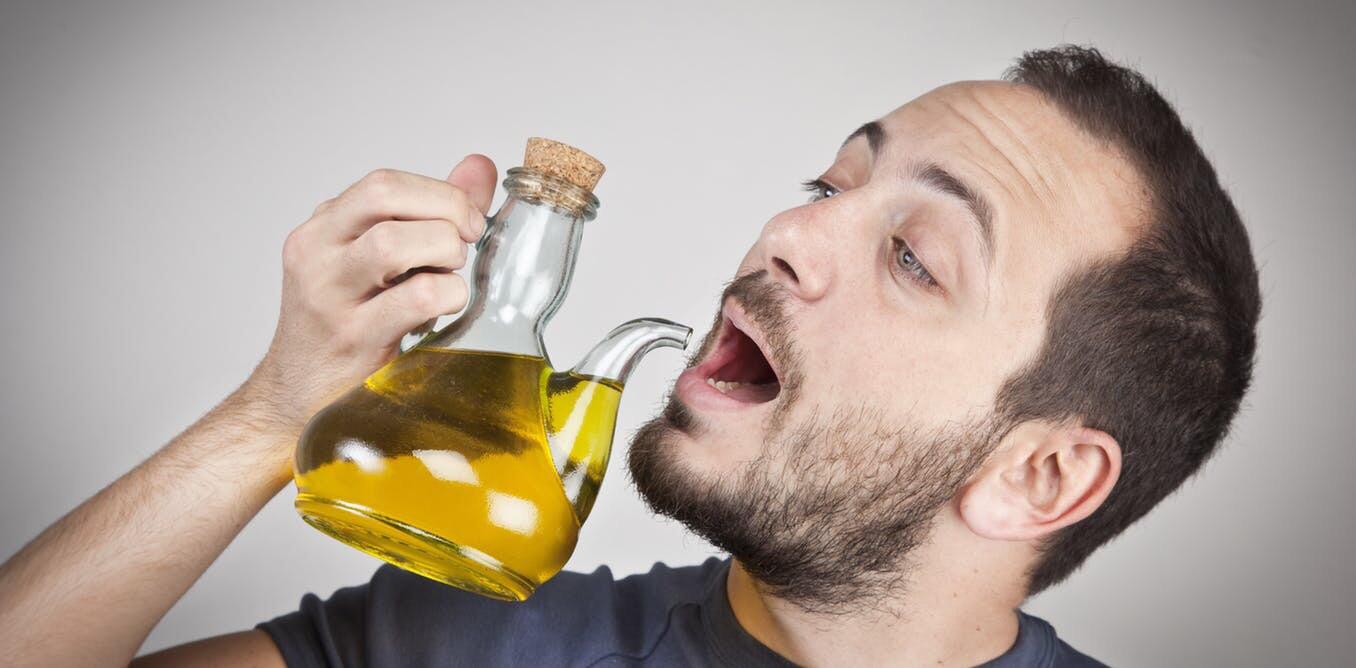 Man drinking olive oil r/wtfstockphotos