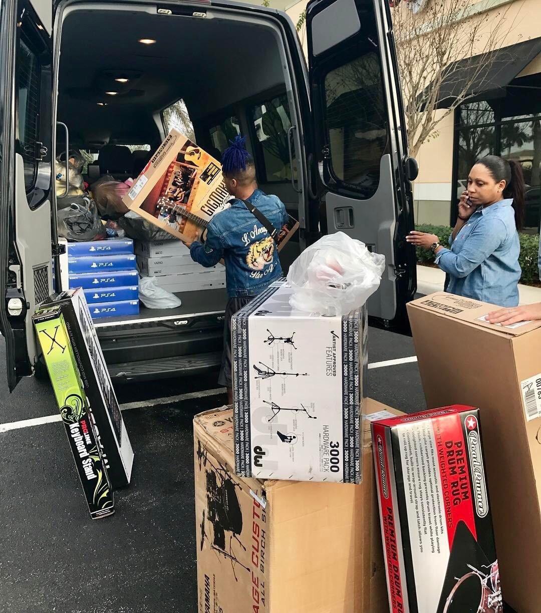 One of my favorite pictures of X doing an act of charity, donating