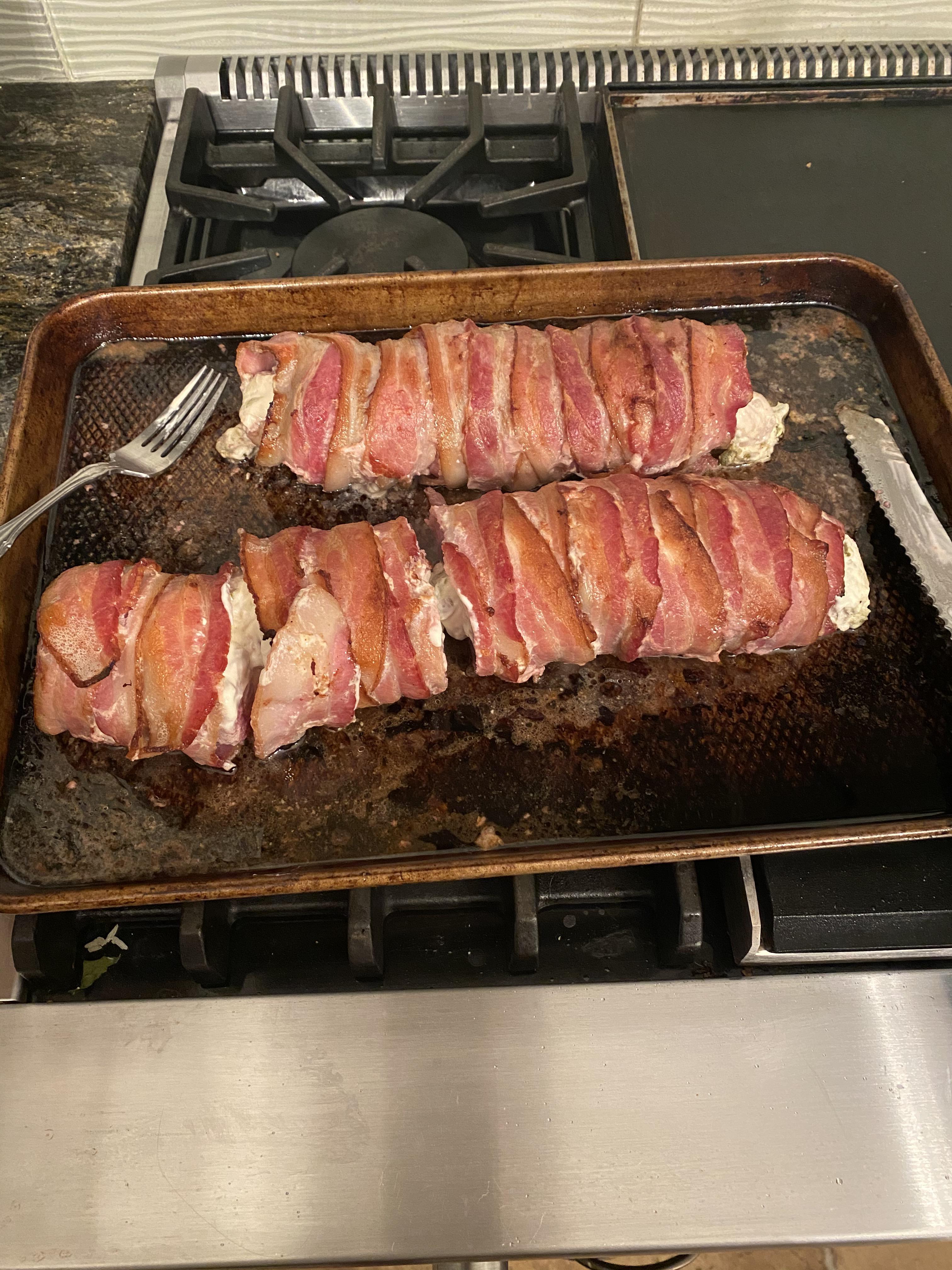 Deer backstrap stuffed with cream cheese and jalapeños, wrapped in bacon. r/Hunting