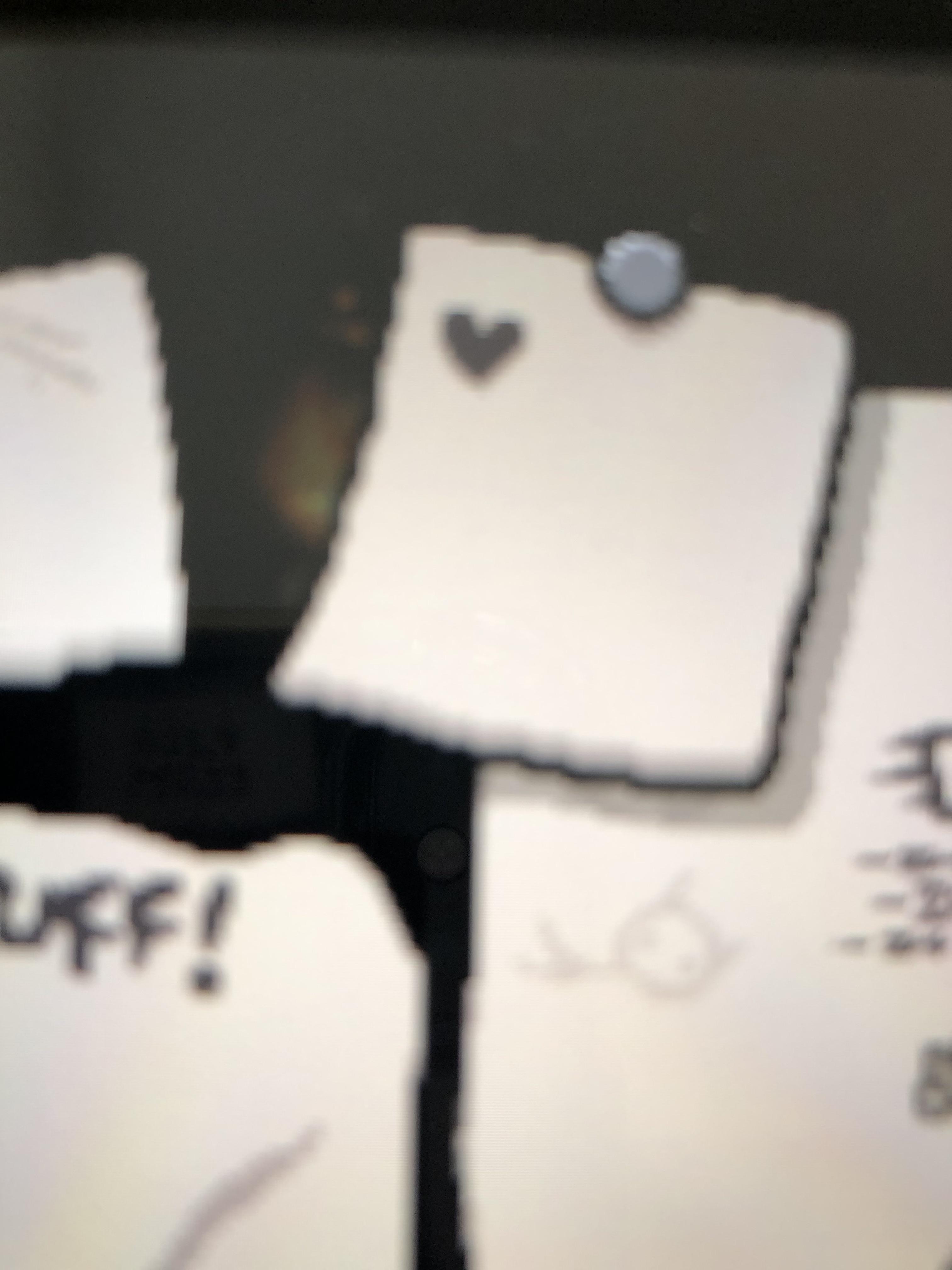 What does this little note with the black heart mean when I pause the