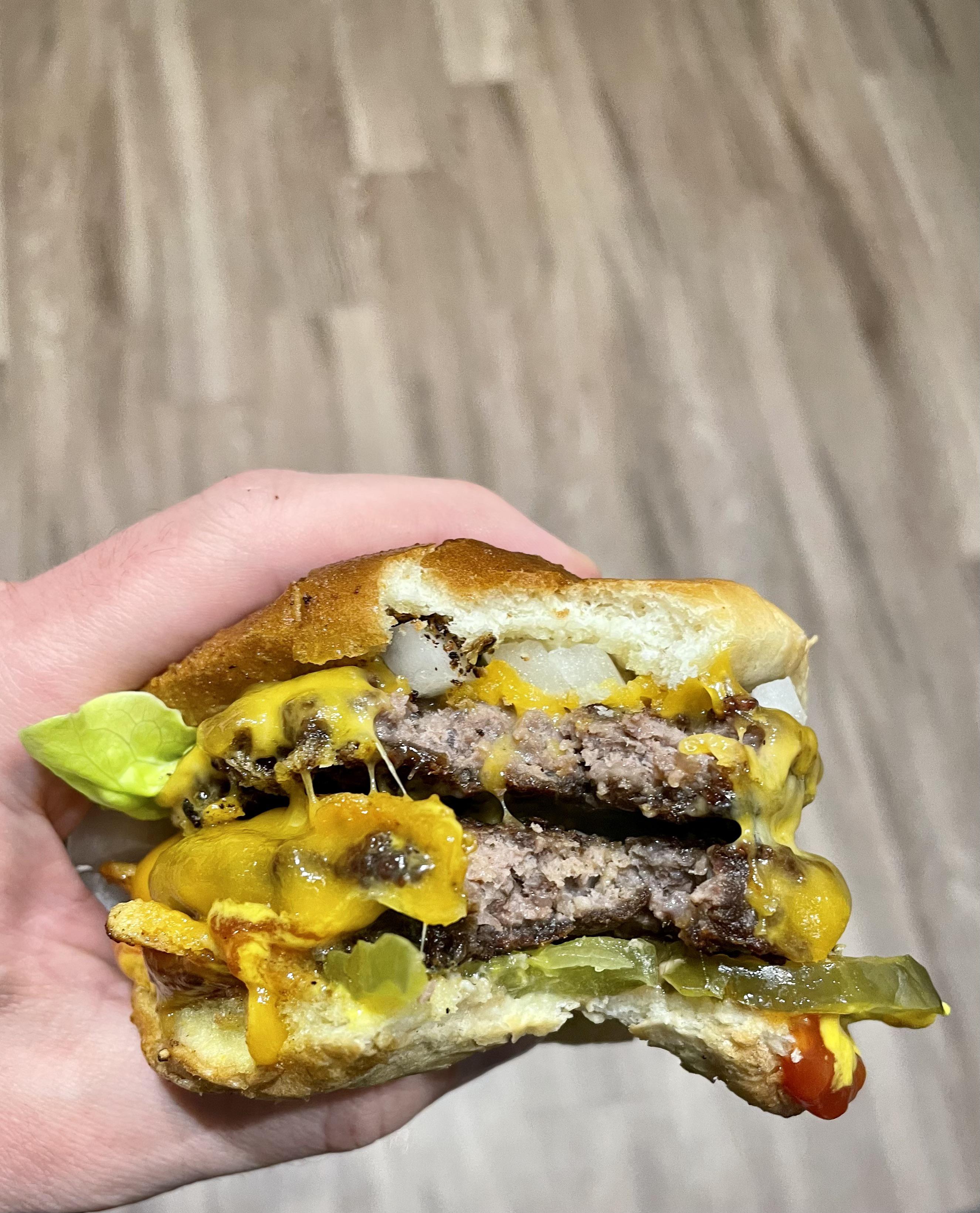Homemade double. Sharp cheddar, patties fried in mustard, lettuce