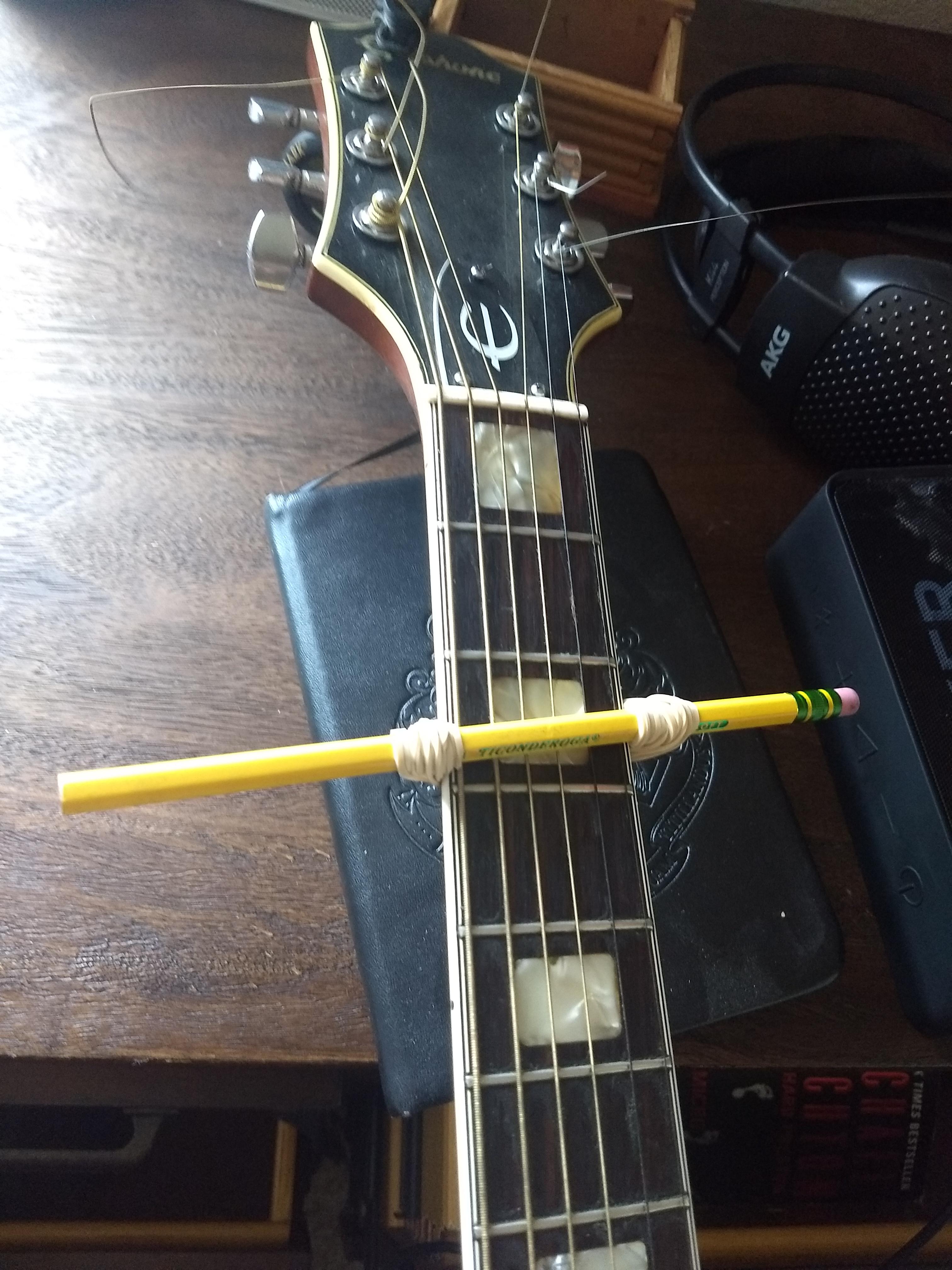 couldn't find a capo, had to make do ) r/guitars