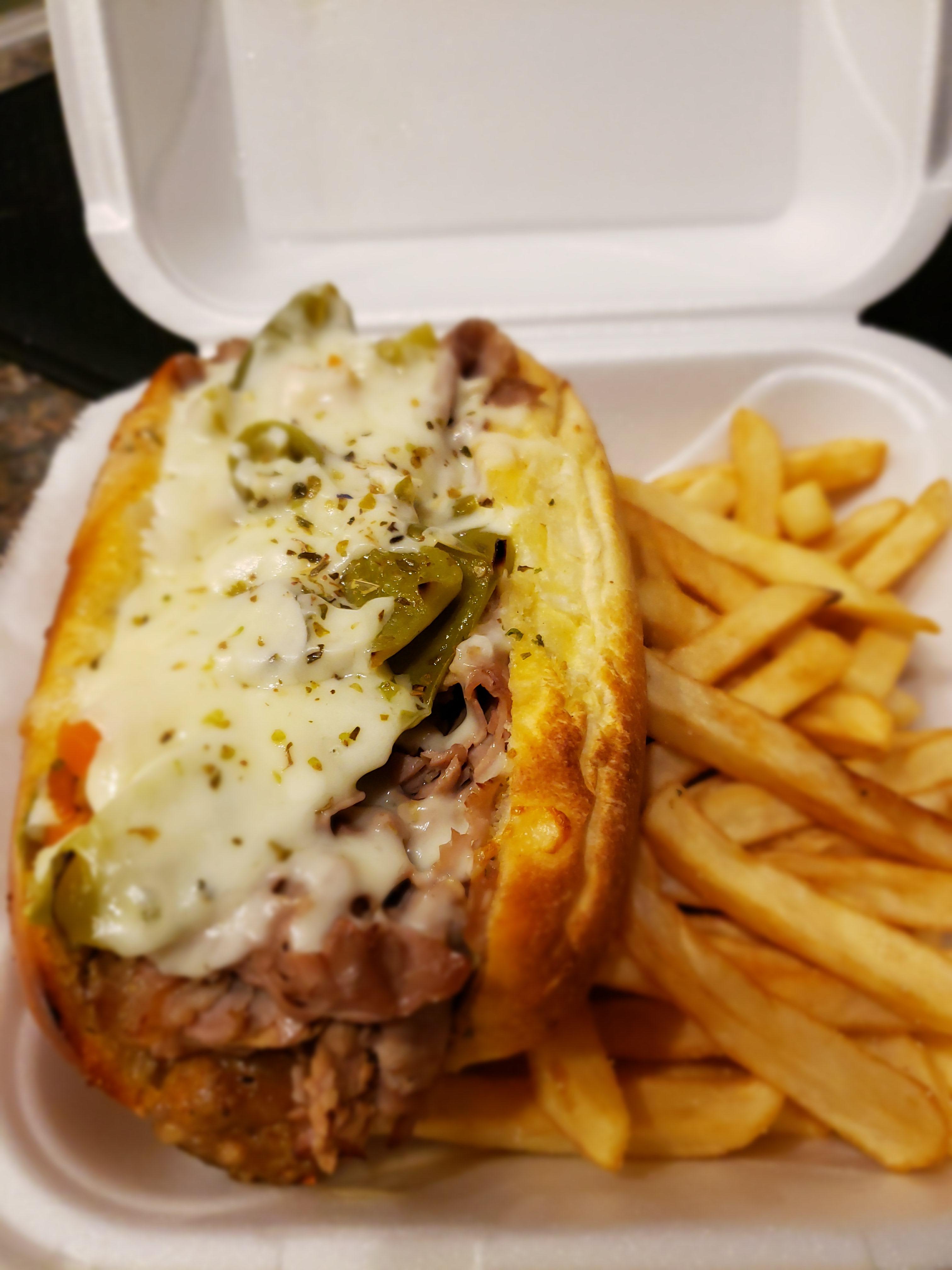 The Godfather Italian beef and sausage on garlic buttered bread topped