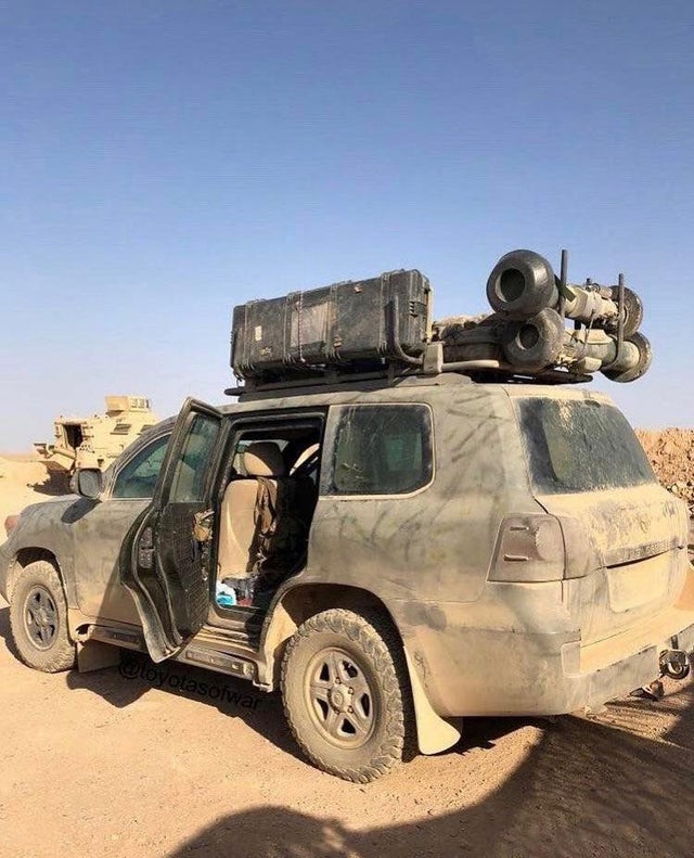 FSA technicals and armor line up to engage IS held positions west of