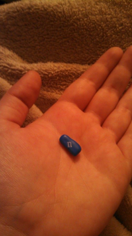 Check out this weird M&M I found shaped all weird with an "n" on it