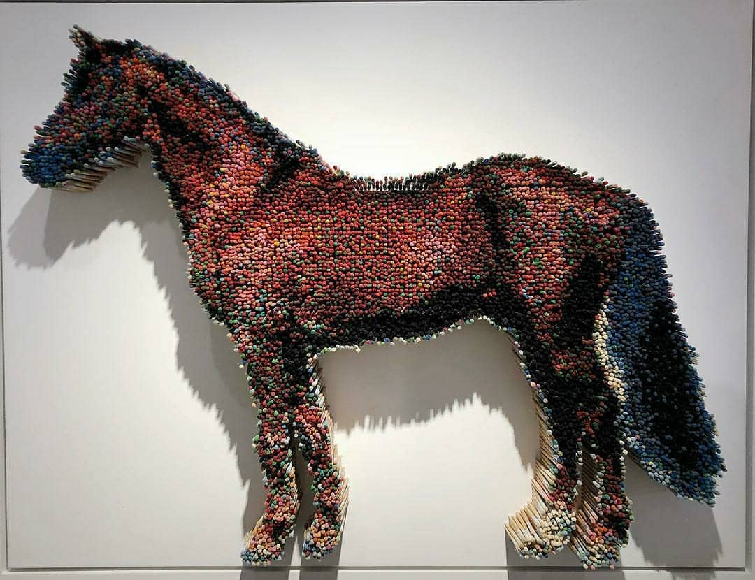 A horse made of paint brushes. r/interestingasfuck