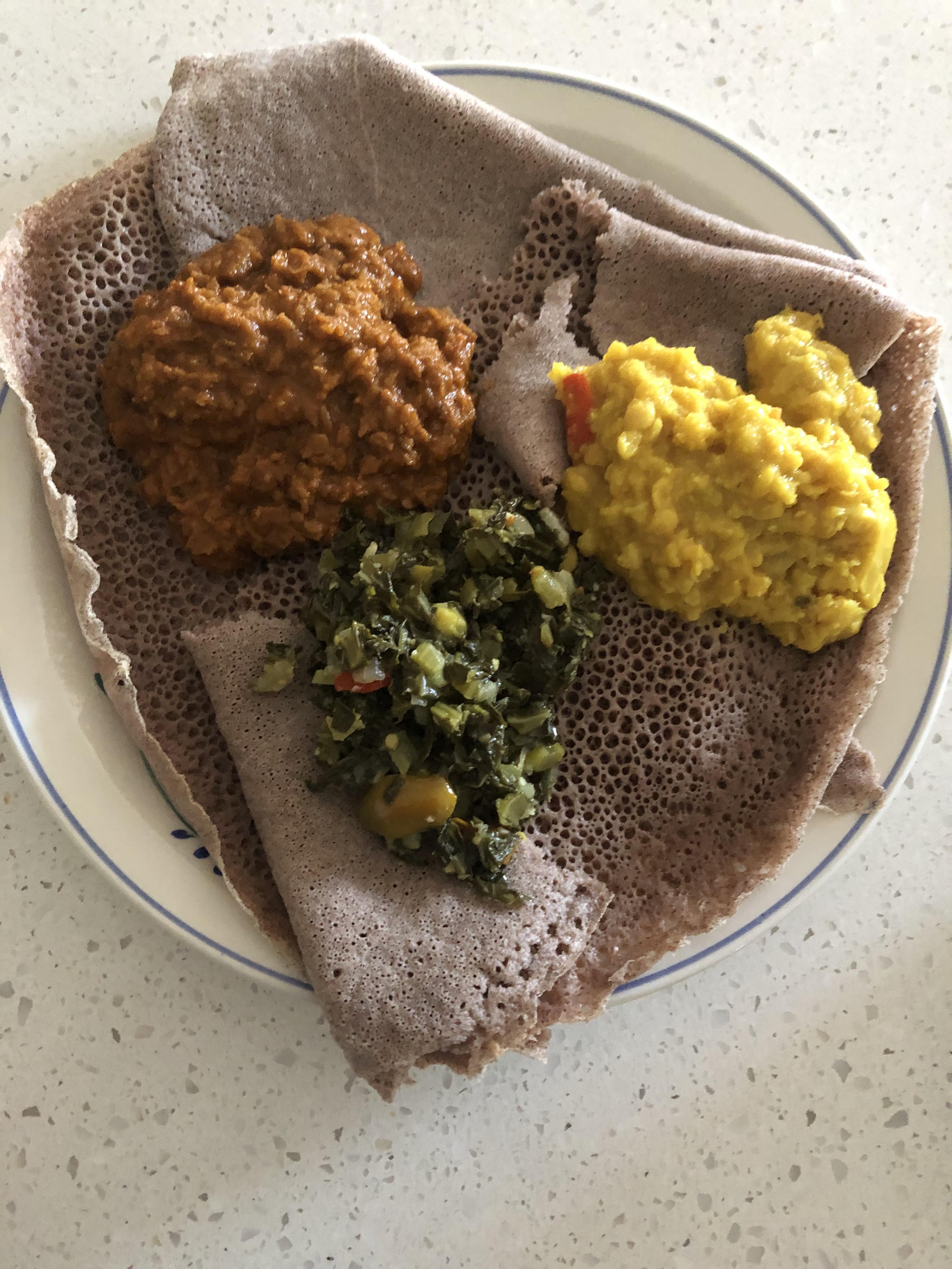 A plate of delicious Ethiopian vegetarian food, made by my darling