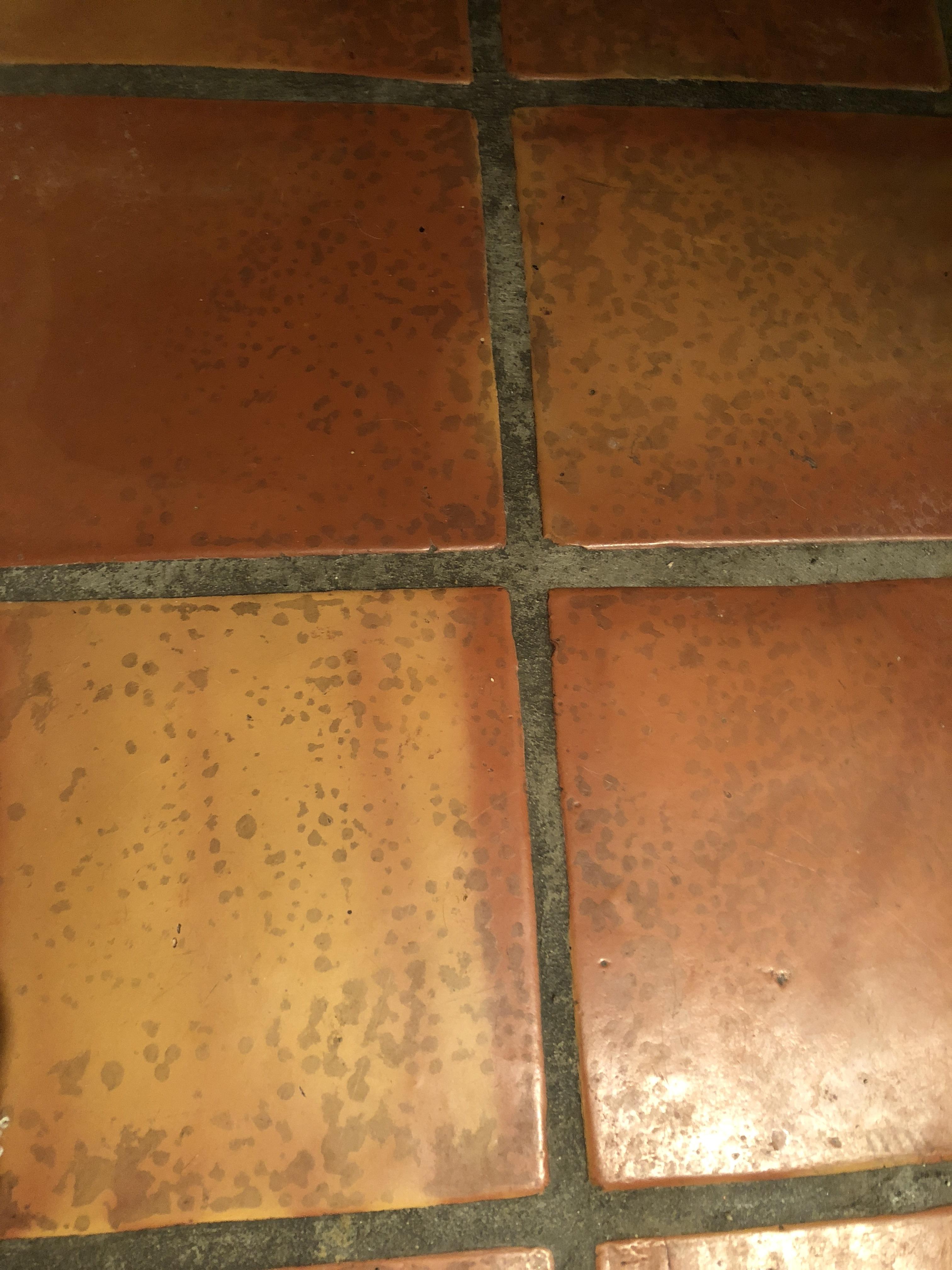 How to get rid of stains like this on terracotta floors? howto