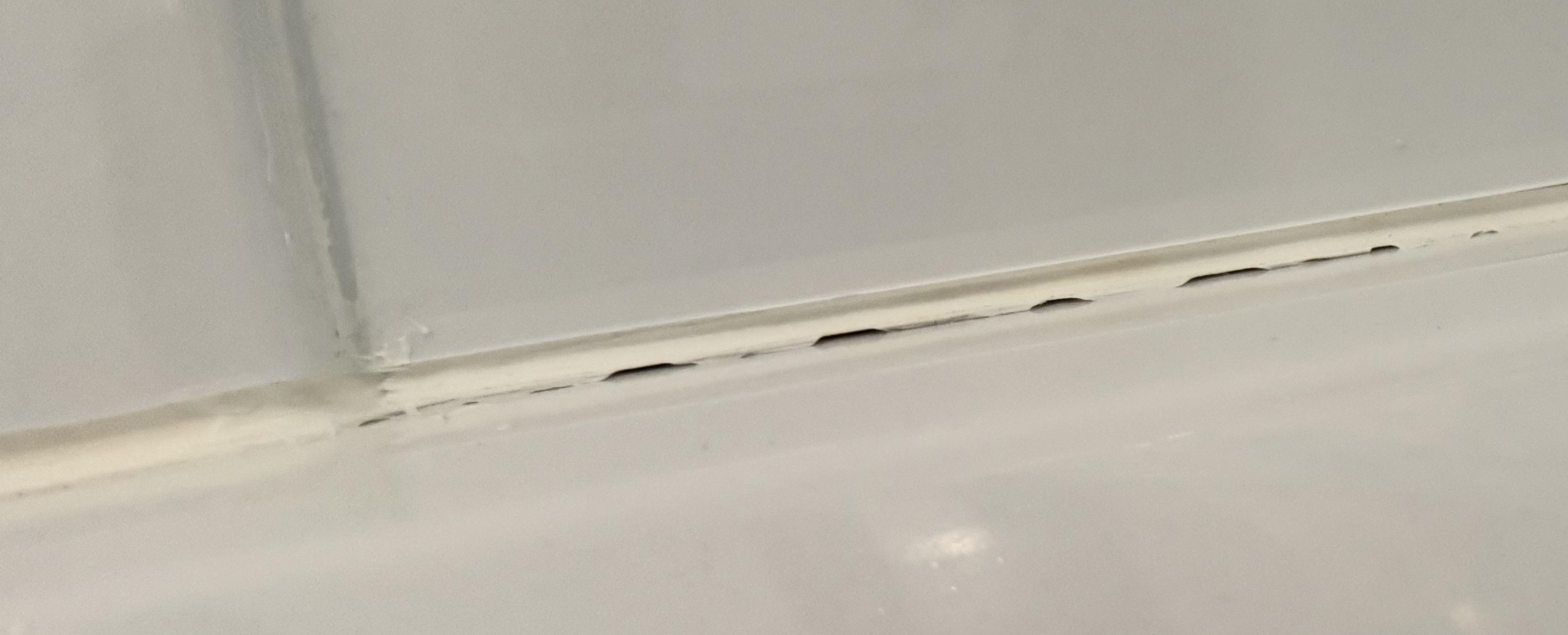 Do I need to be concerned about these gaps/holes in the caulk around my