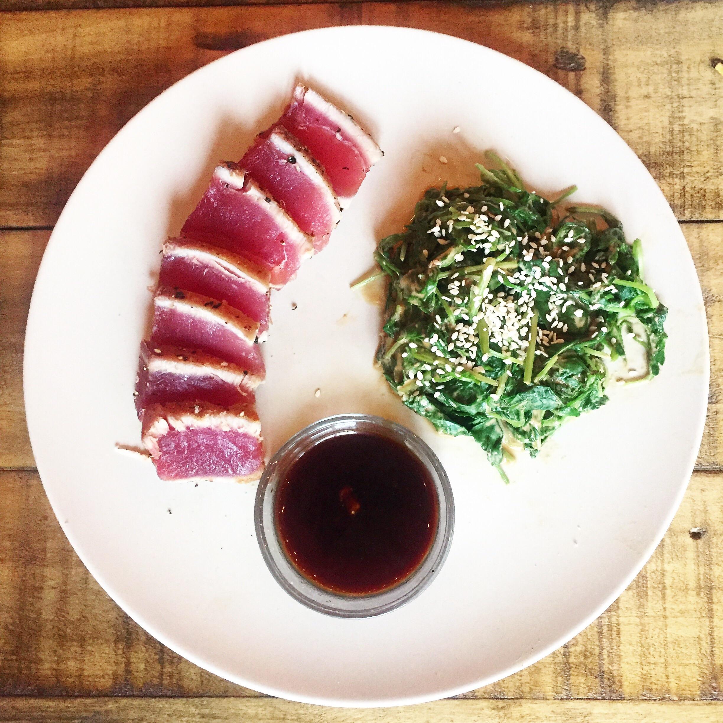 Minimalist dinner. Seared tuna, wilted pea shoots with a miso and