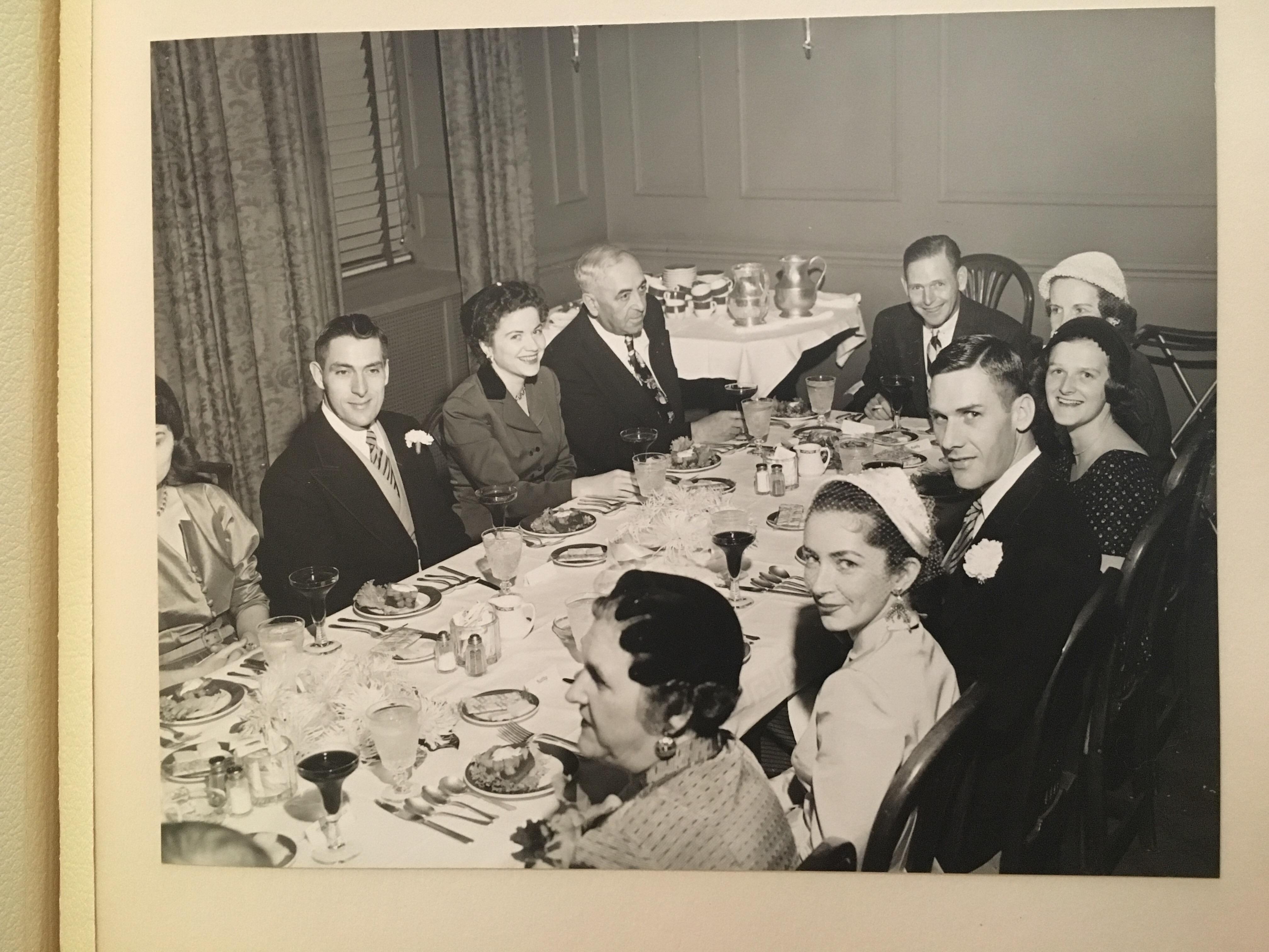 my strikingly handsome grandpa (with the flower looking into the camera