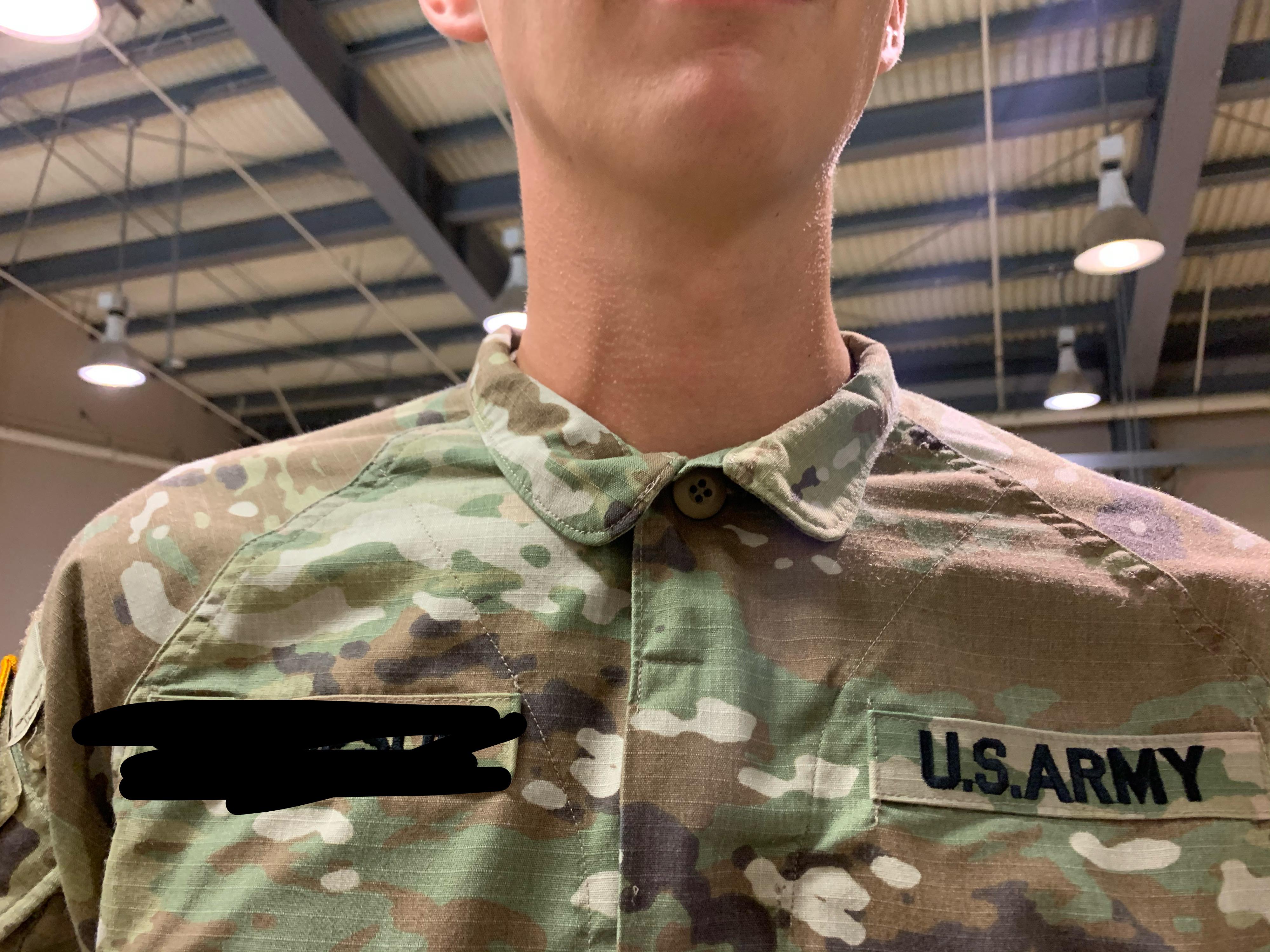 What is the top button on the hot weather uniform for? I have a private