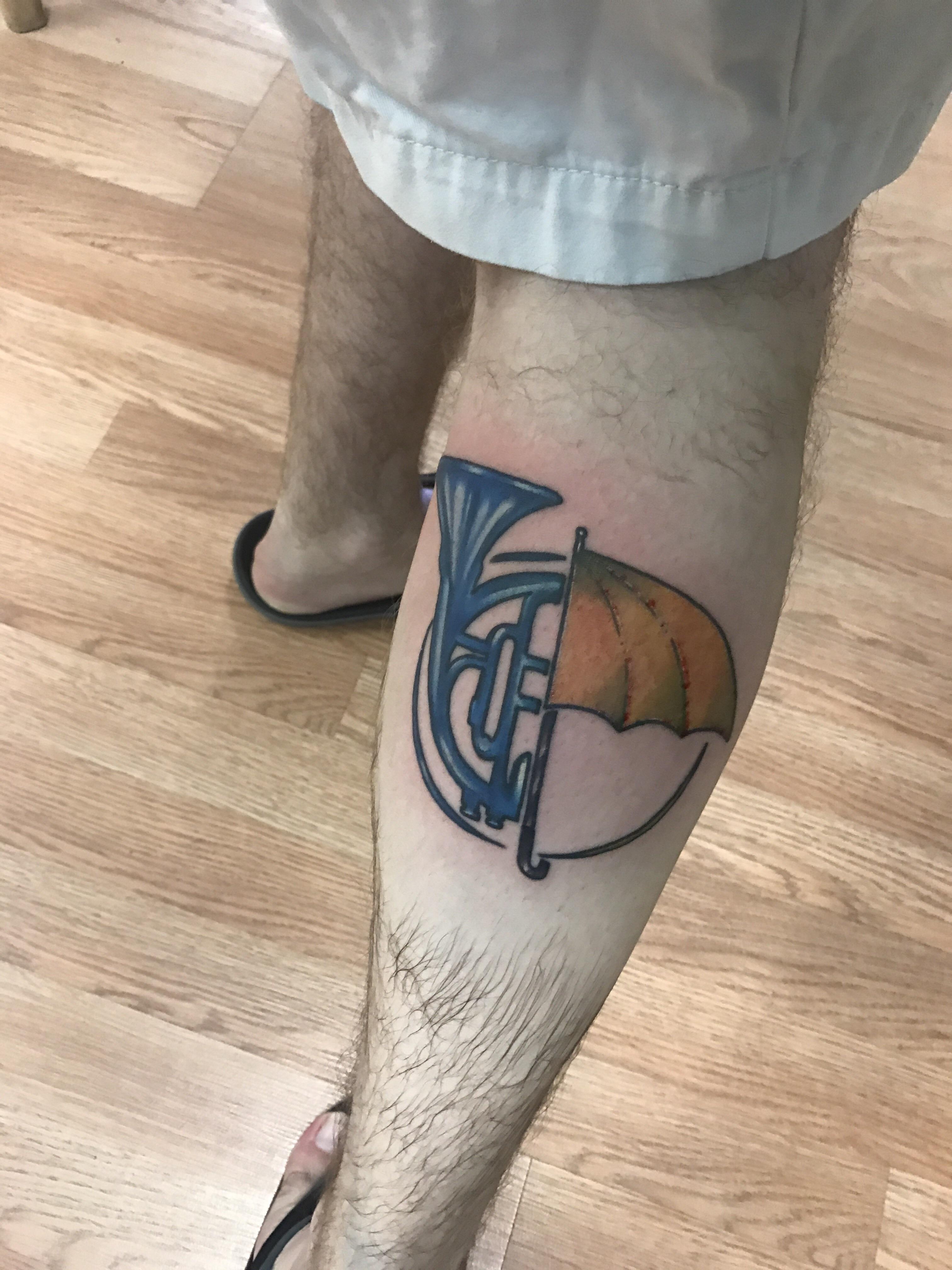 Blue French Horn Tattoo