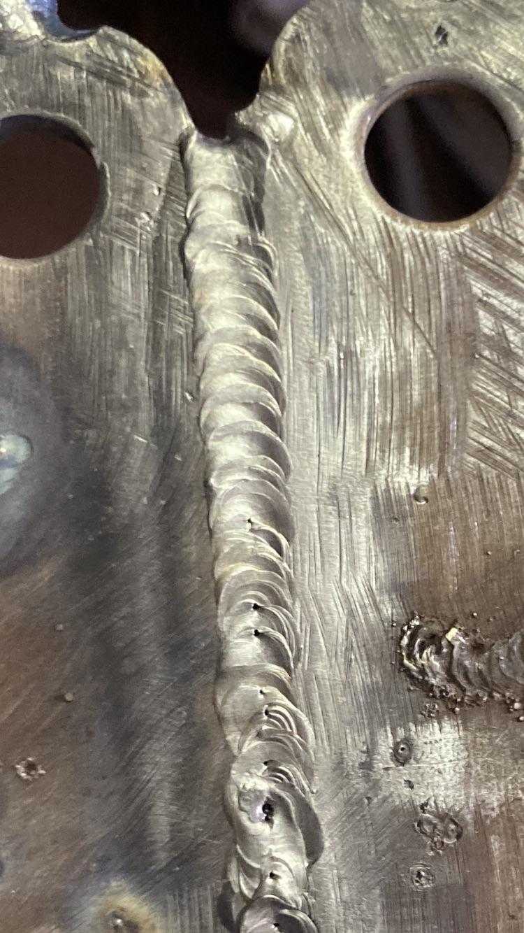 First time tig welding, noticed small holes in the welds. What could I