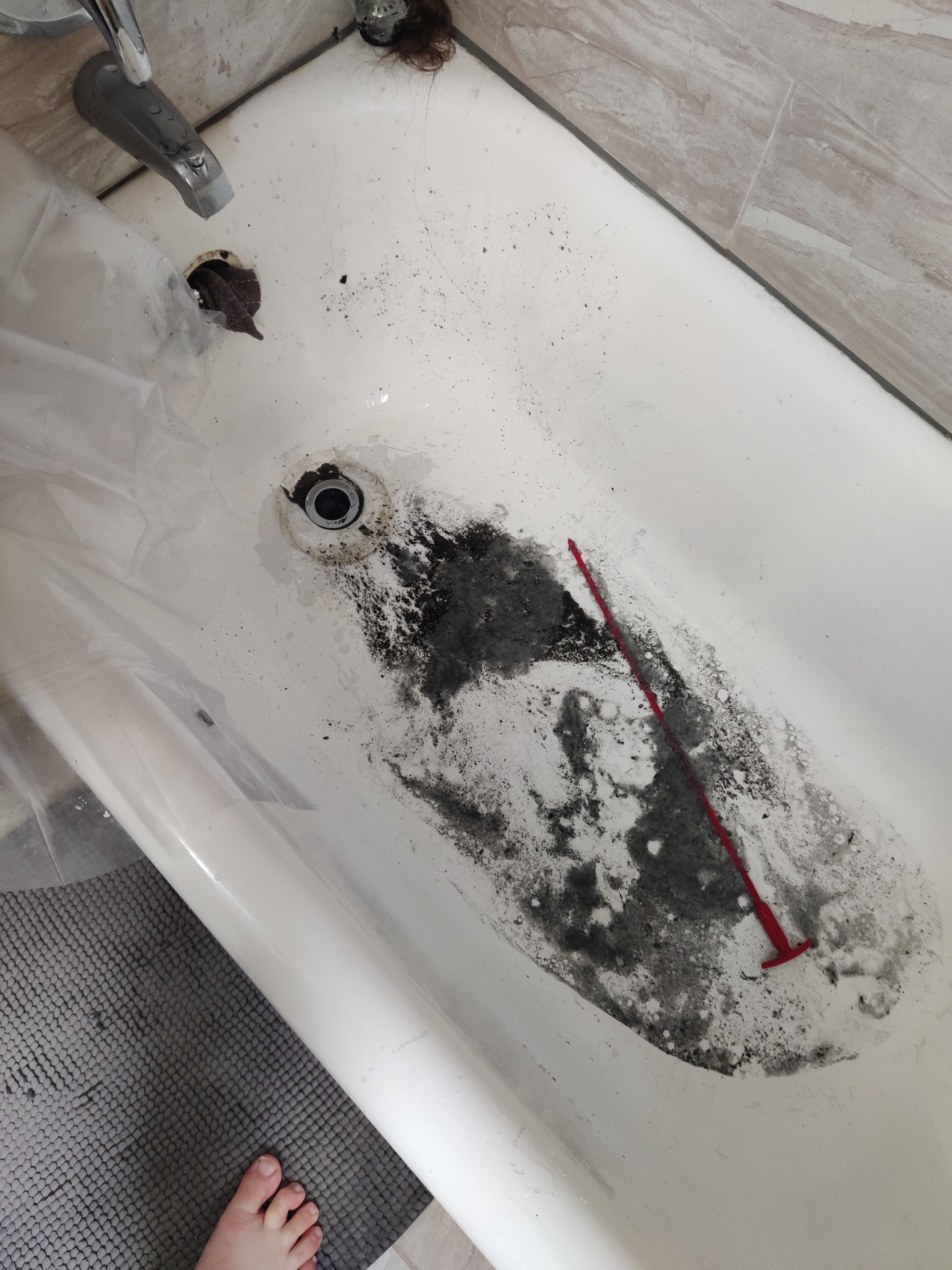 I plunged the slow draining tub. This was the result. But the tub is