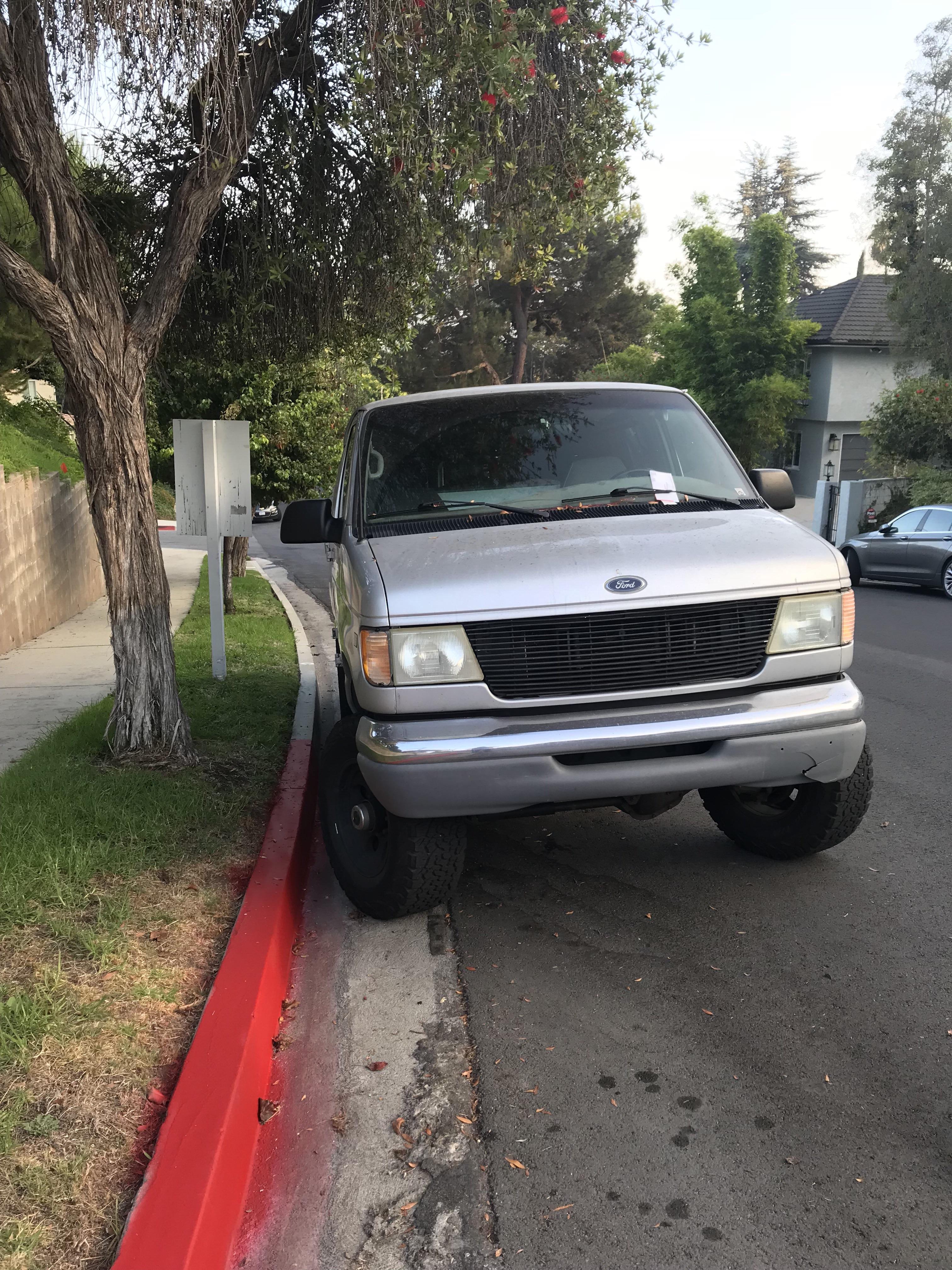 Found a 100 ticket today for parking here...curb was not painted red