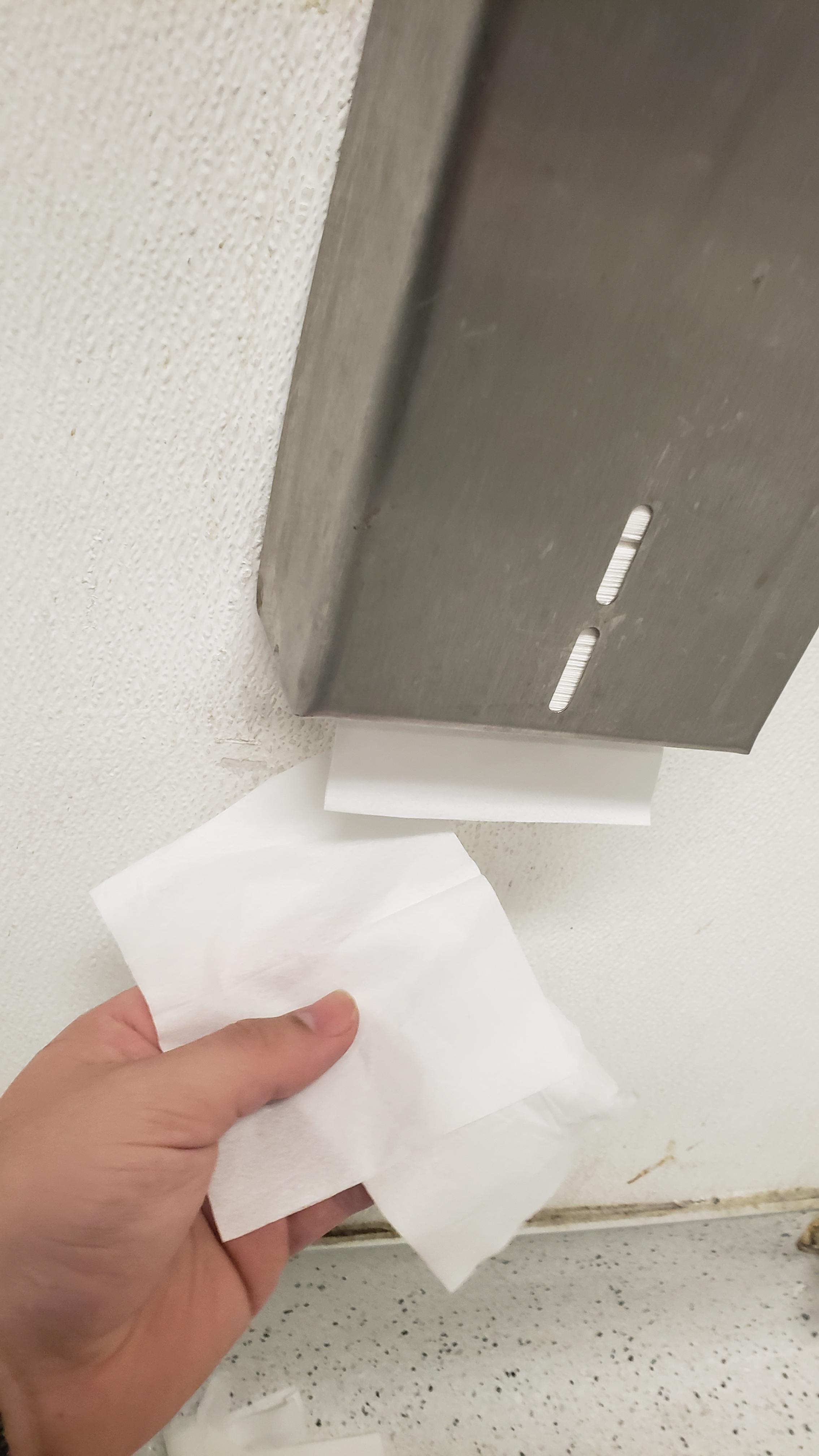 This single square toilet paper dispenser that rips half the time. r