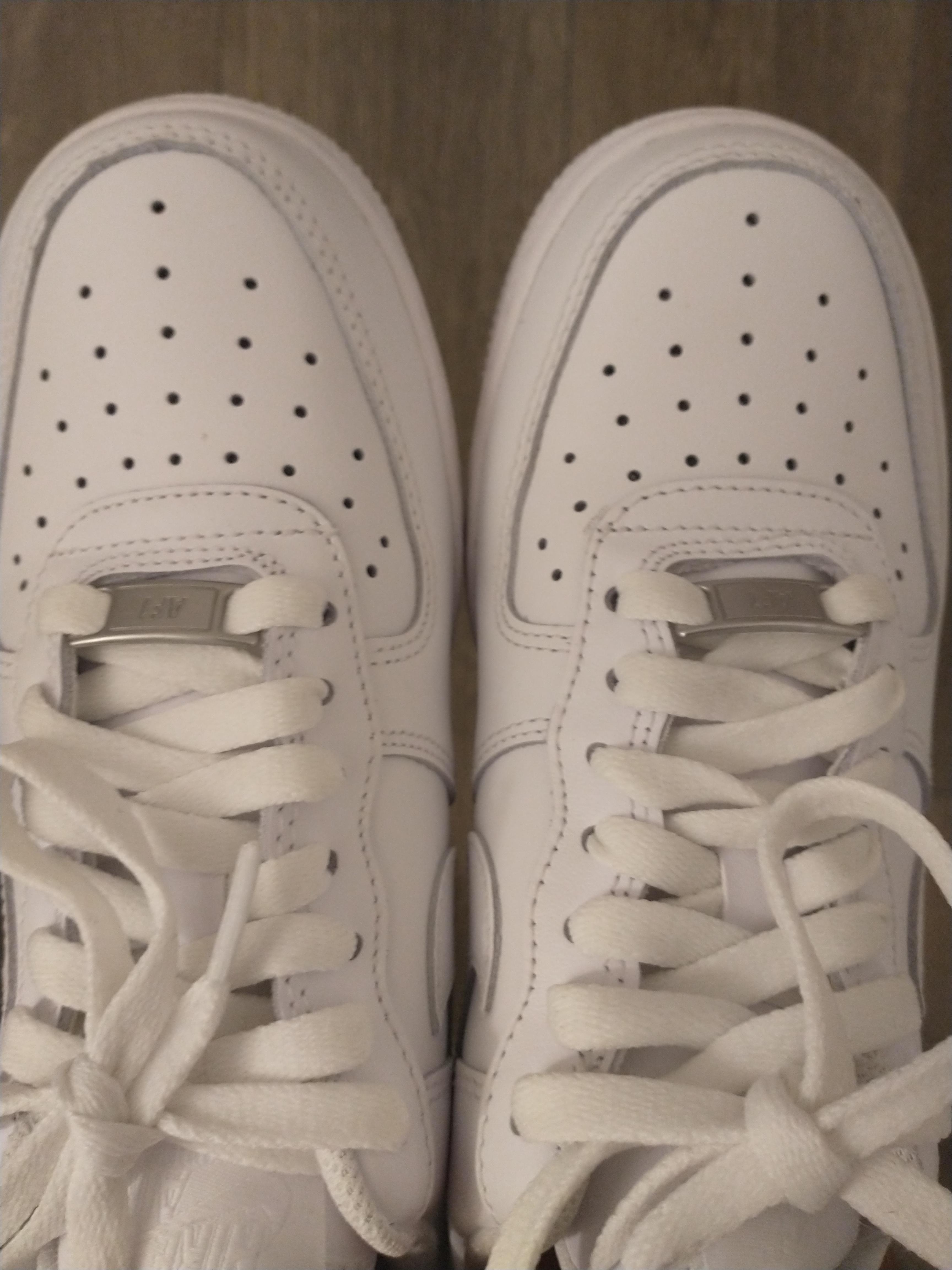 Are these Air Force 1s defective or am I being picky? See right shoe