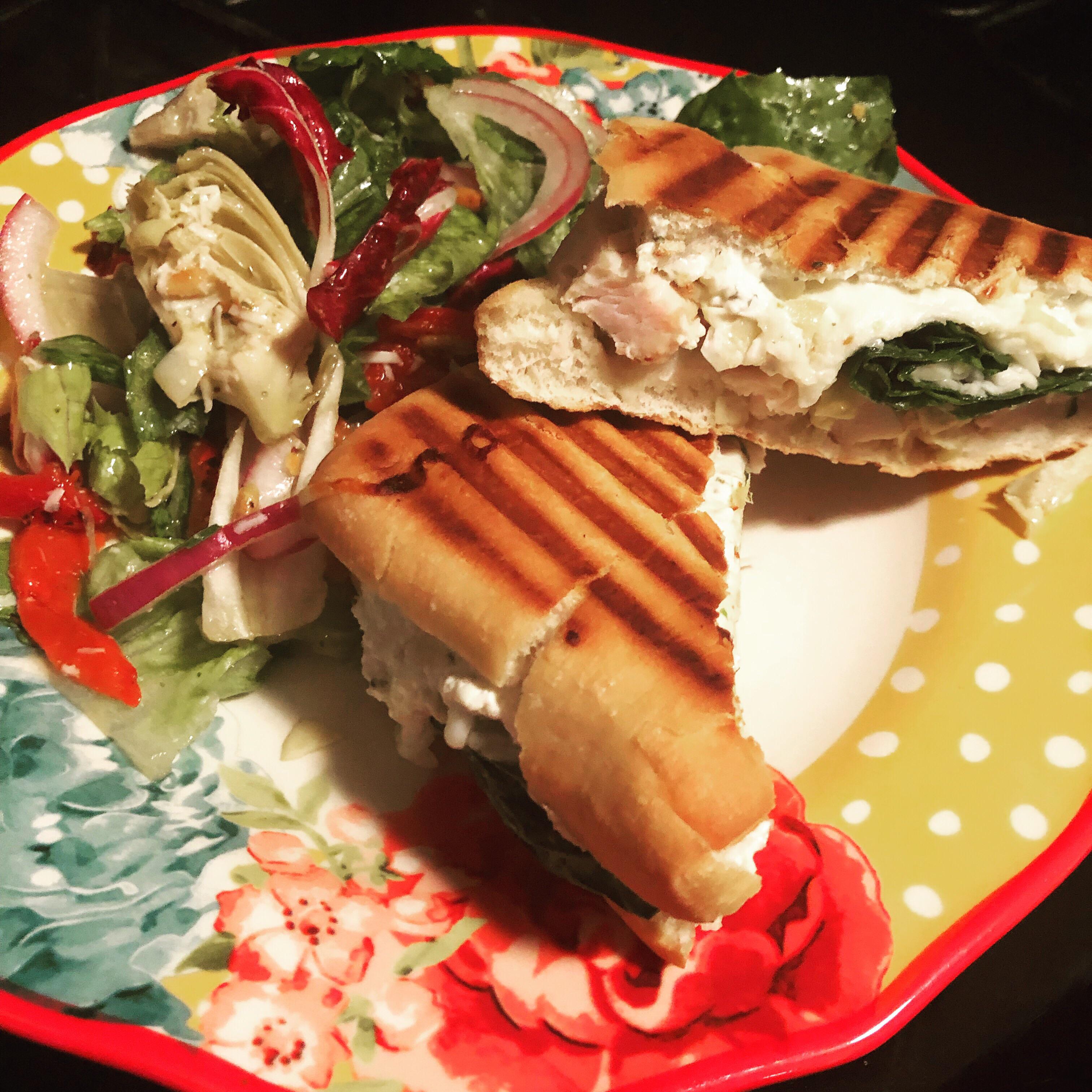 Chicken, spinach and artichoke panini paired with an Italian salad