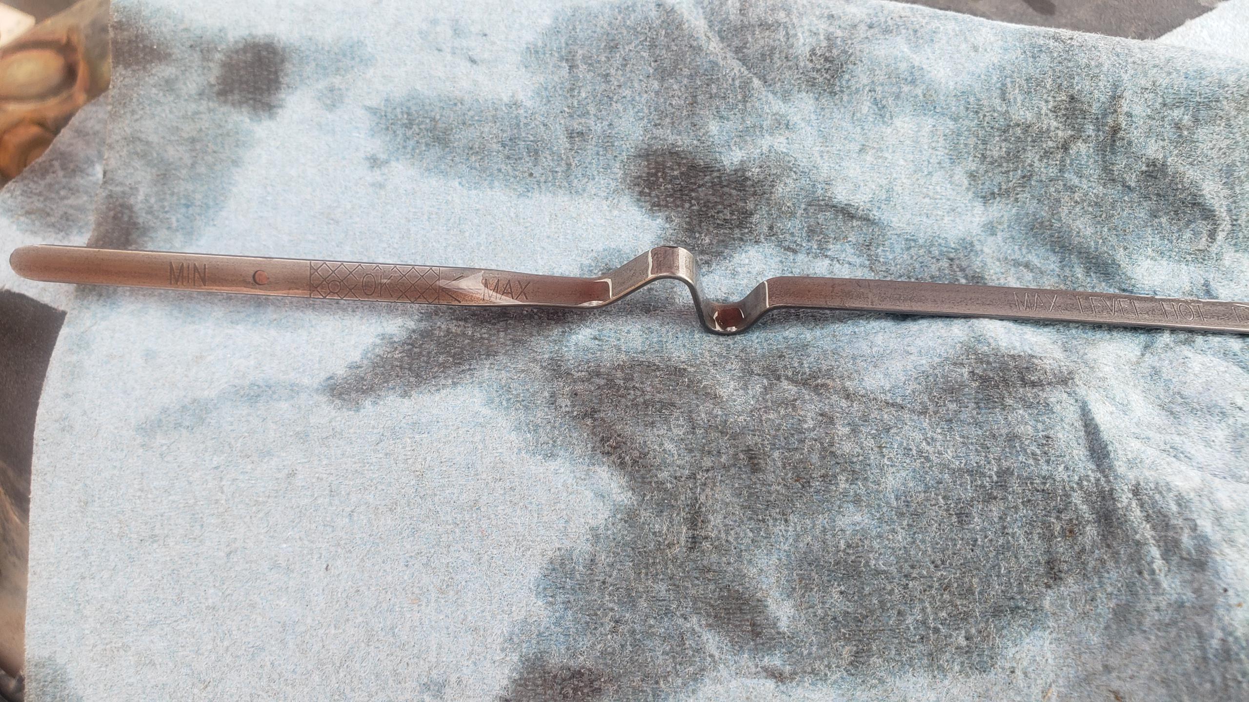 Struggling to read trans fluid dipstick r/MechanicAdvice