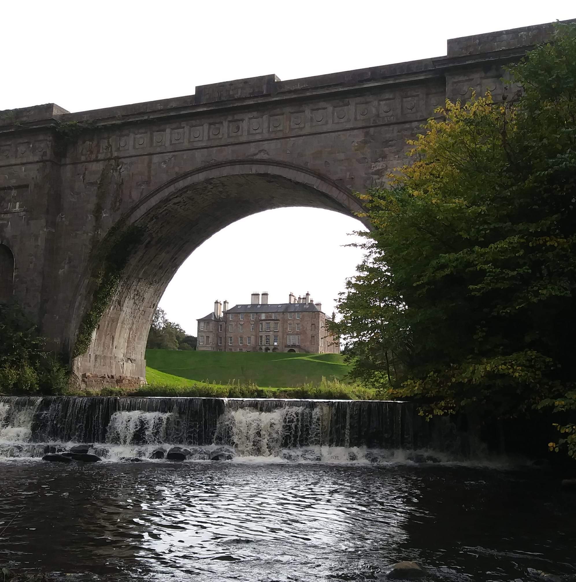 Dalkeith Palace, formerly Dalkeith Castle, as seen framed through the