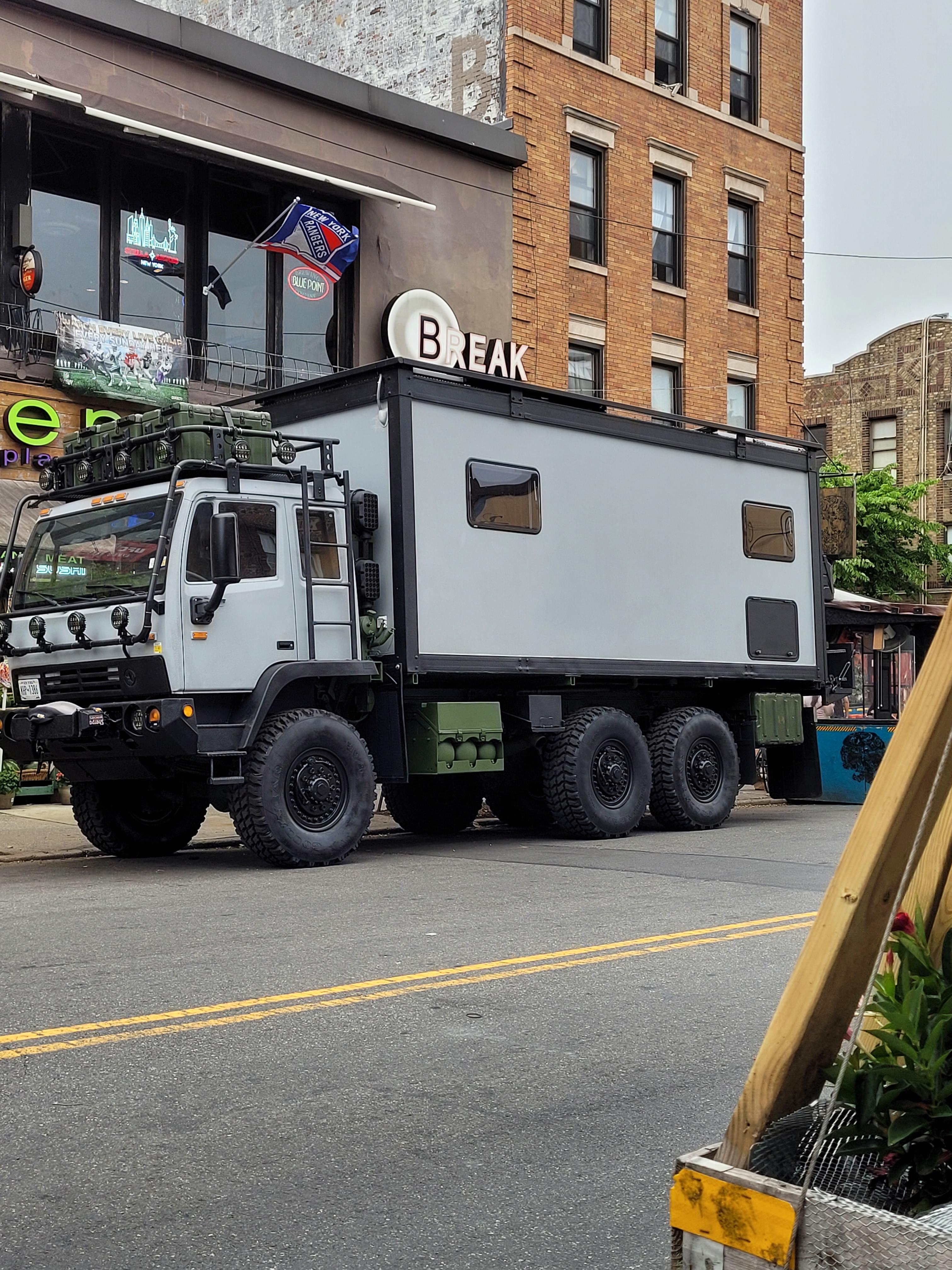 unusual big truck parked by Green Bay market at broadway r/astoria