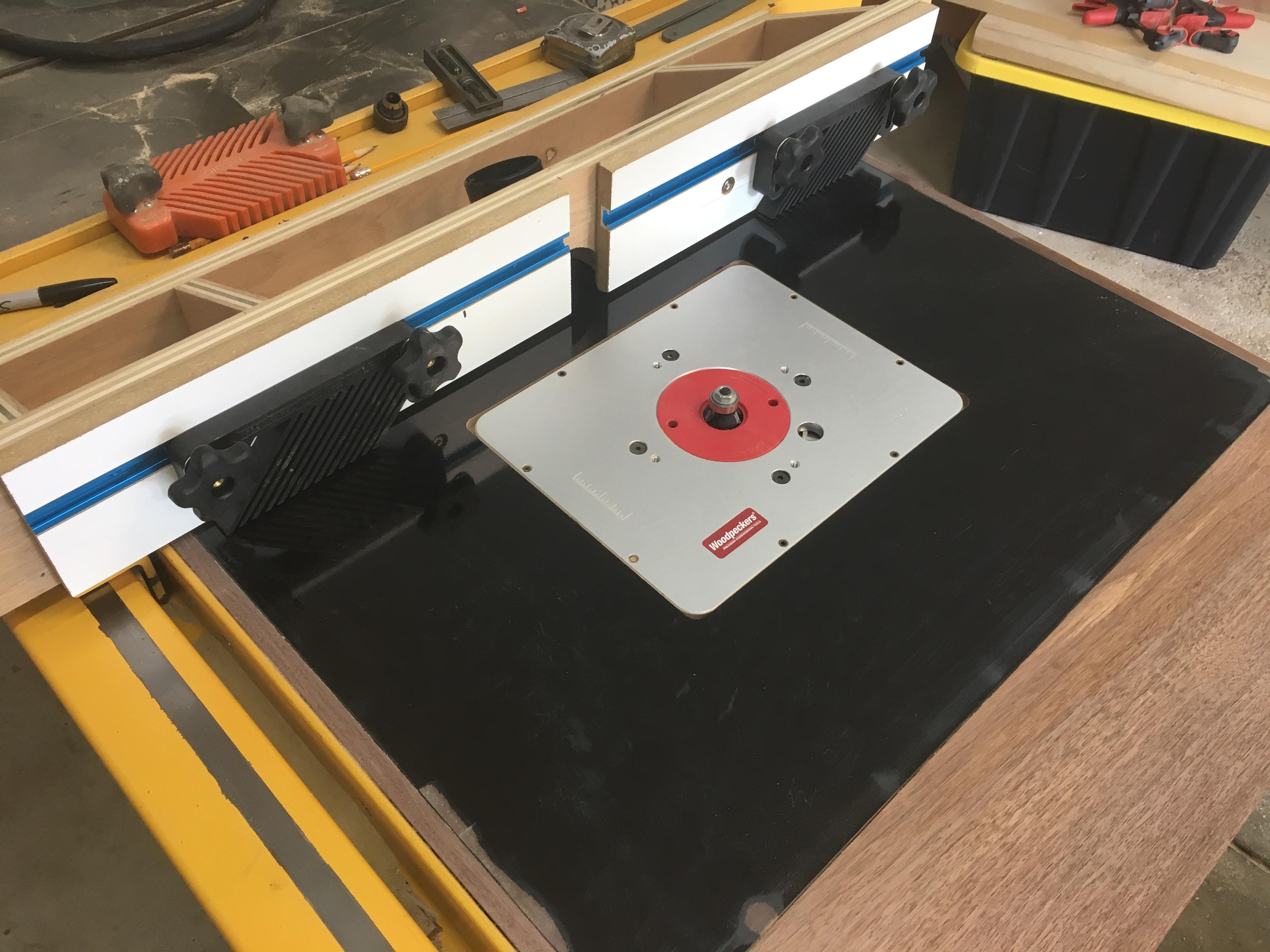 I made myself an adjustable mouth router fence to clamp onto my table