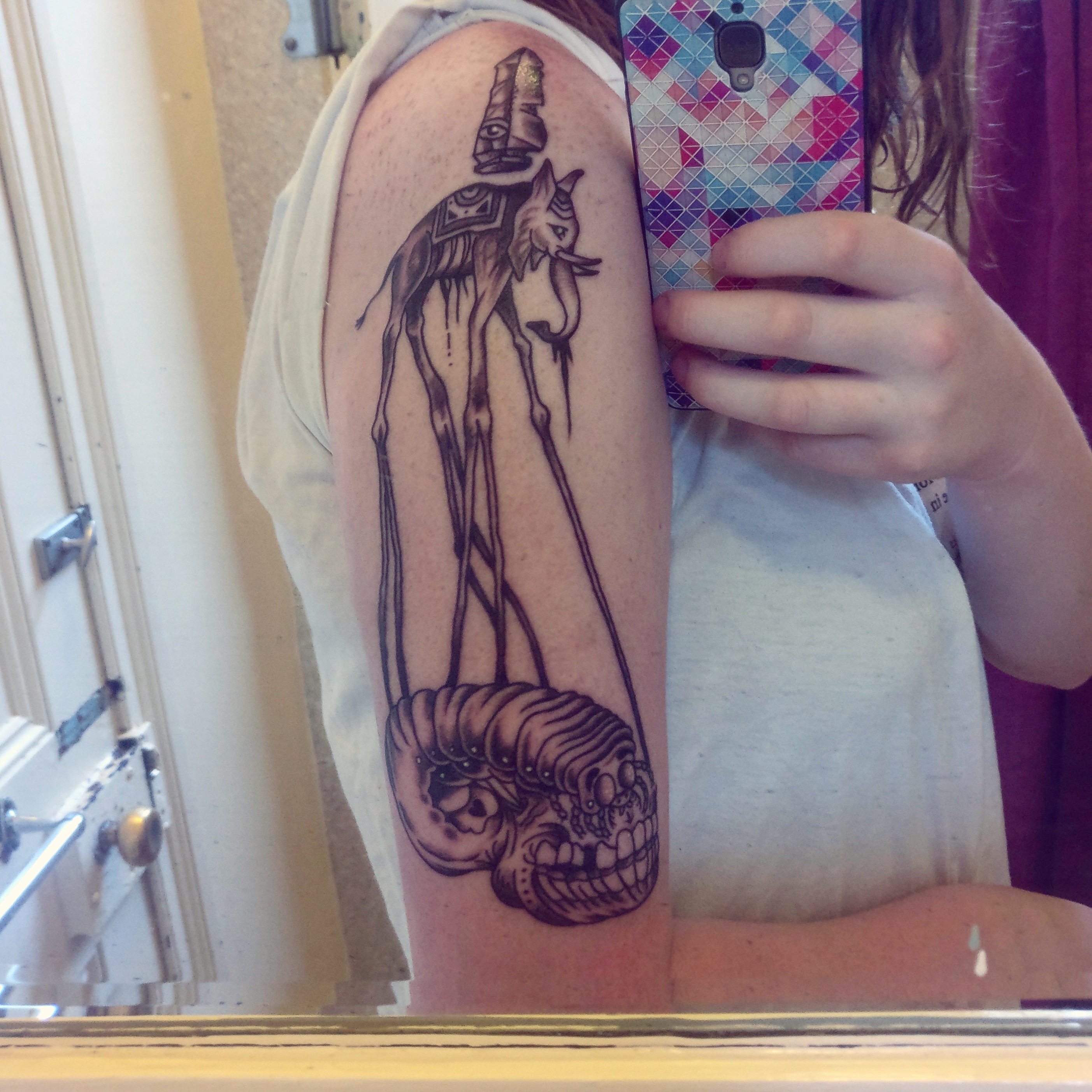 Salvador Dali inspired tattoo done by Nick Yap at Jetty Road Tattoo