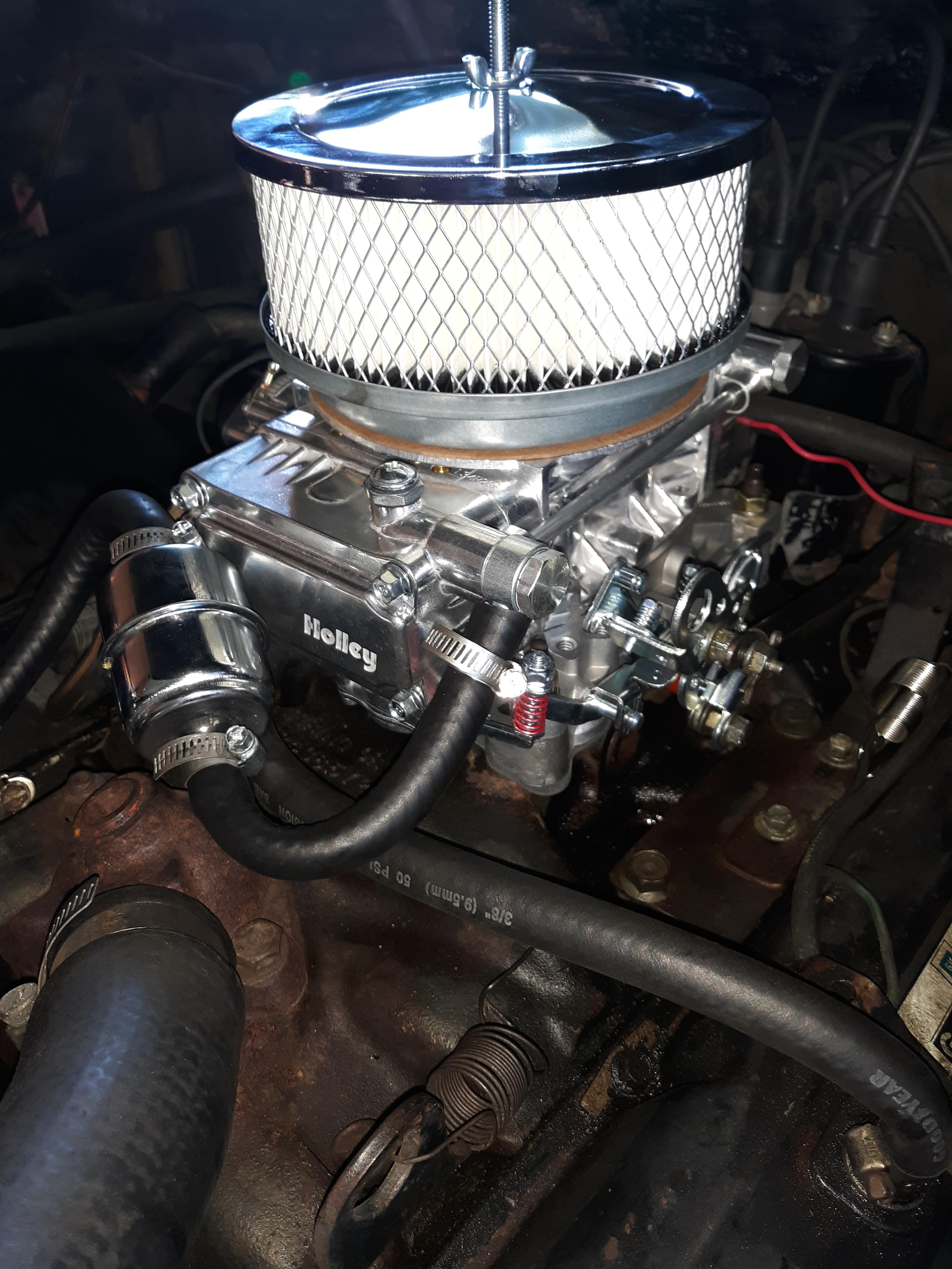 Put this little holley on here until I can properly machine the