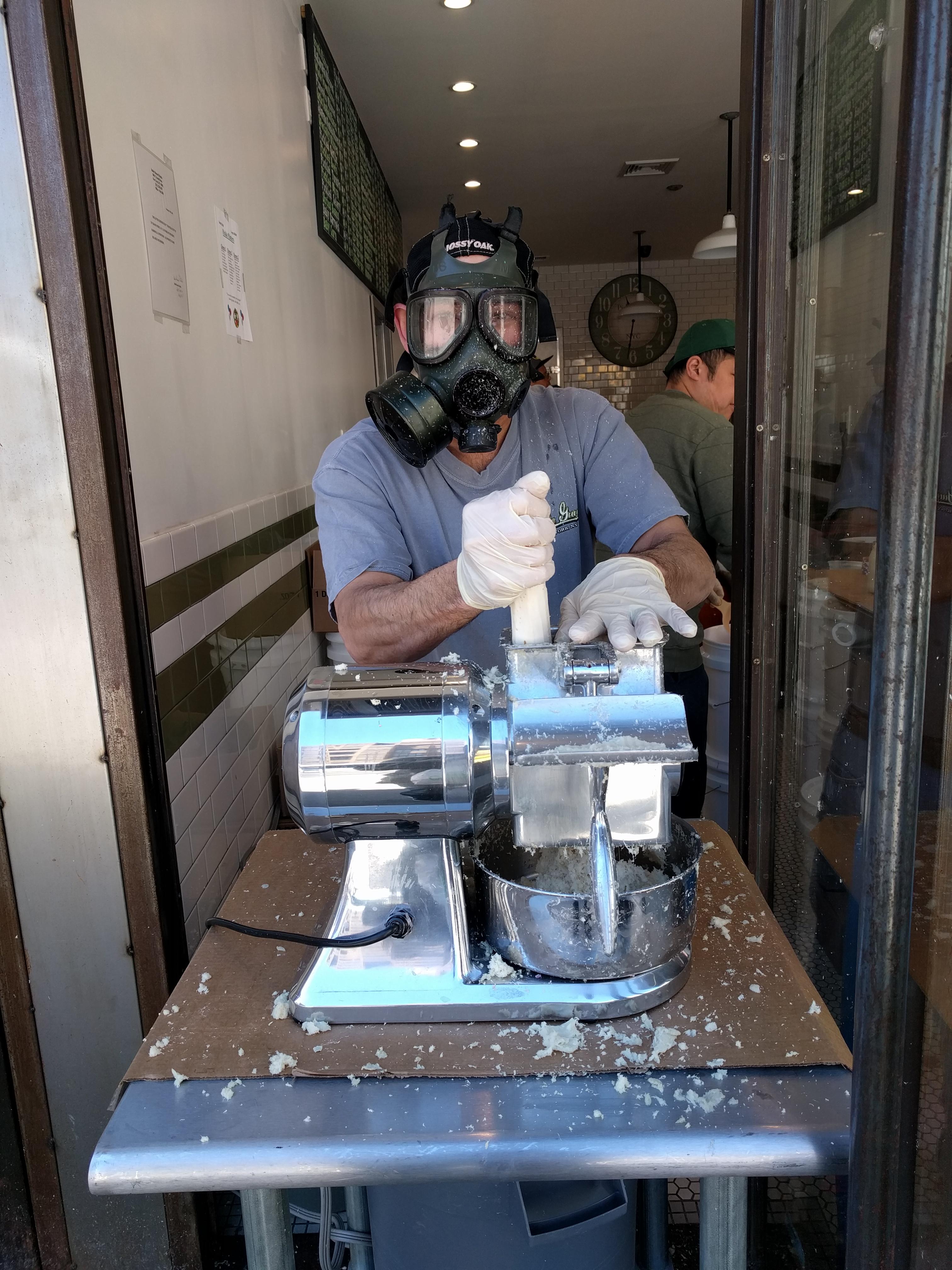Grinding Horseradish in Preparation for the Passover holiday Lower