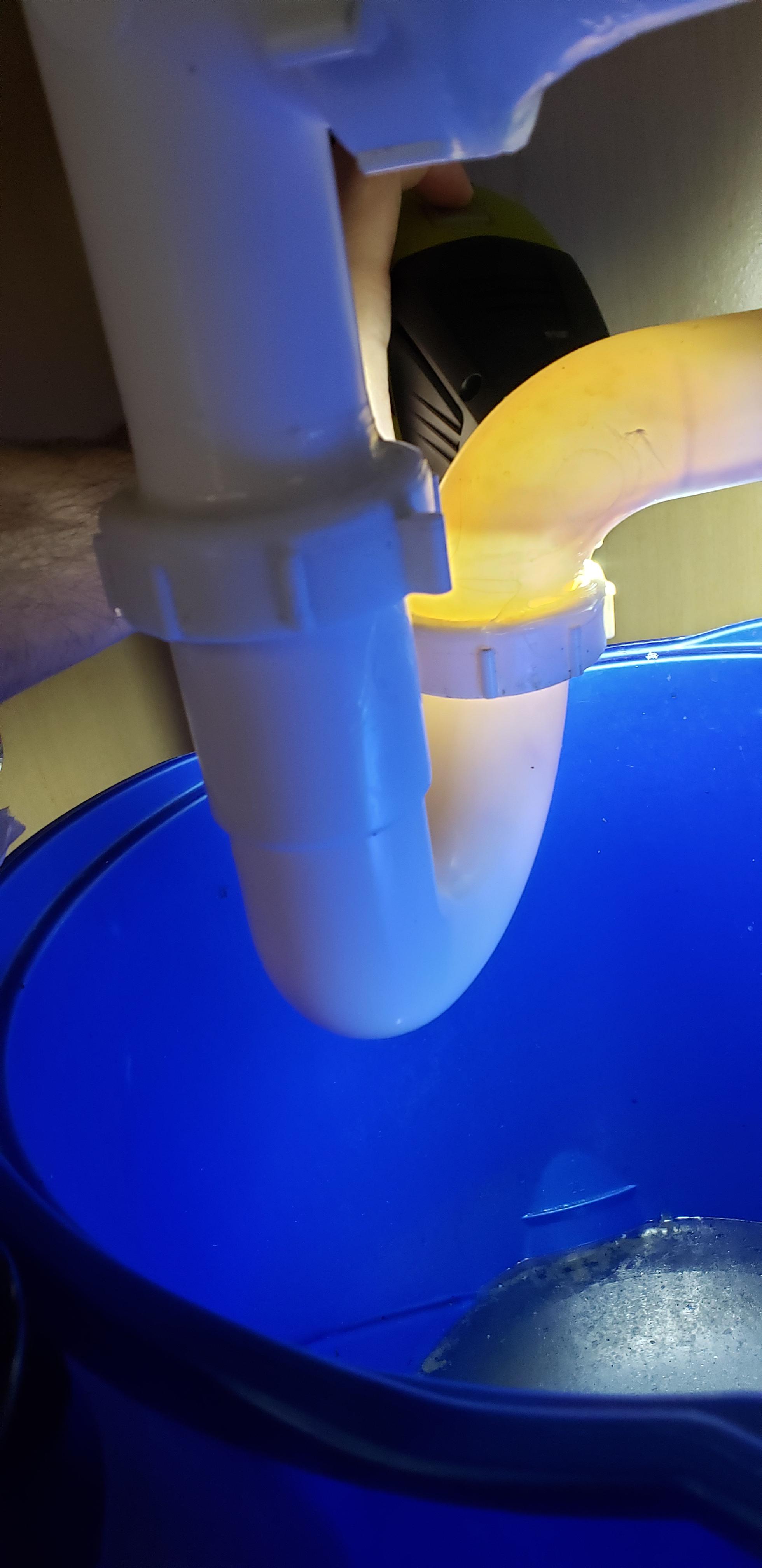 Water filling up in both sinks but not going past trap. Any idea? For context, the right sink