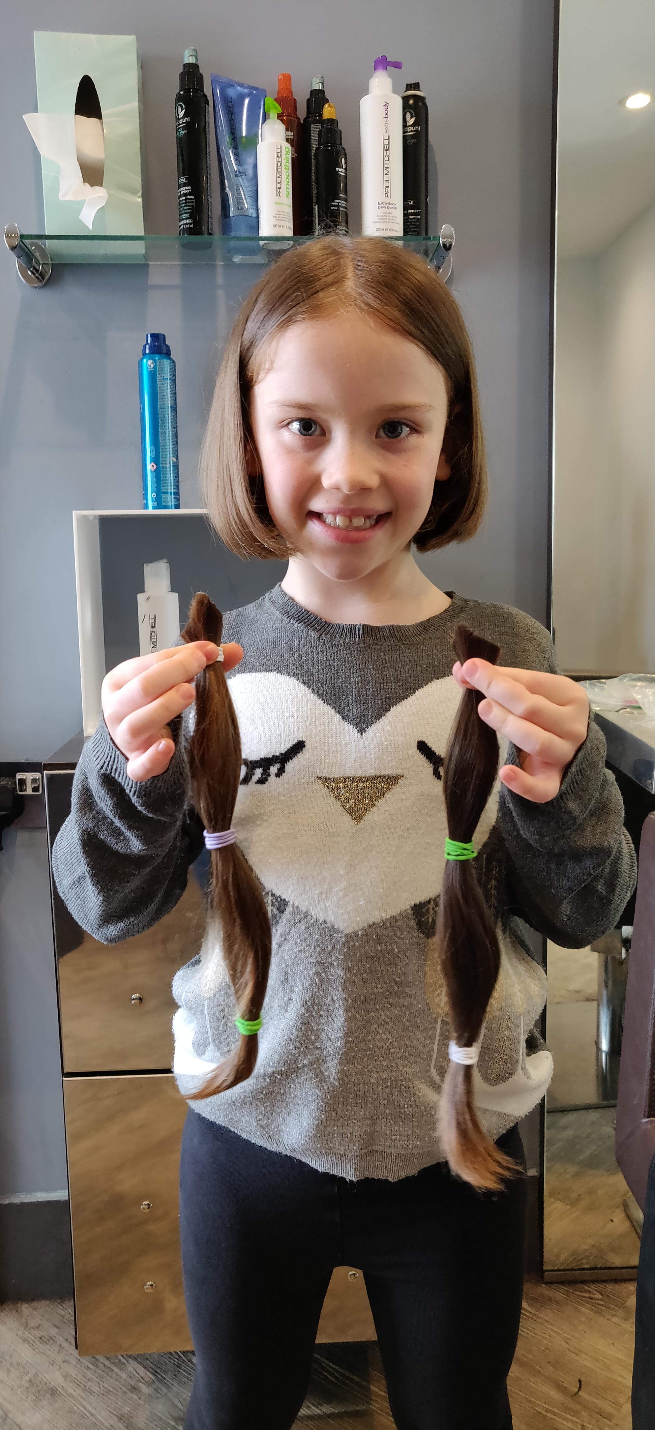 Today my daughter donated 12 inches of hair to The Little Princess Trust (they make real hair