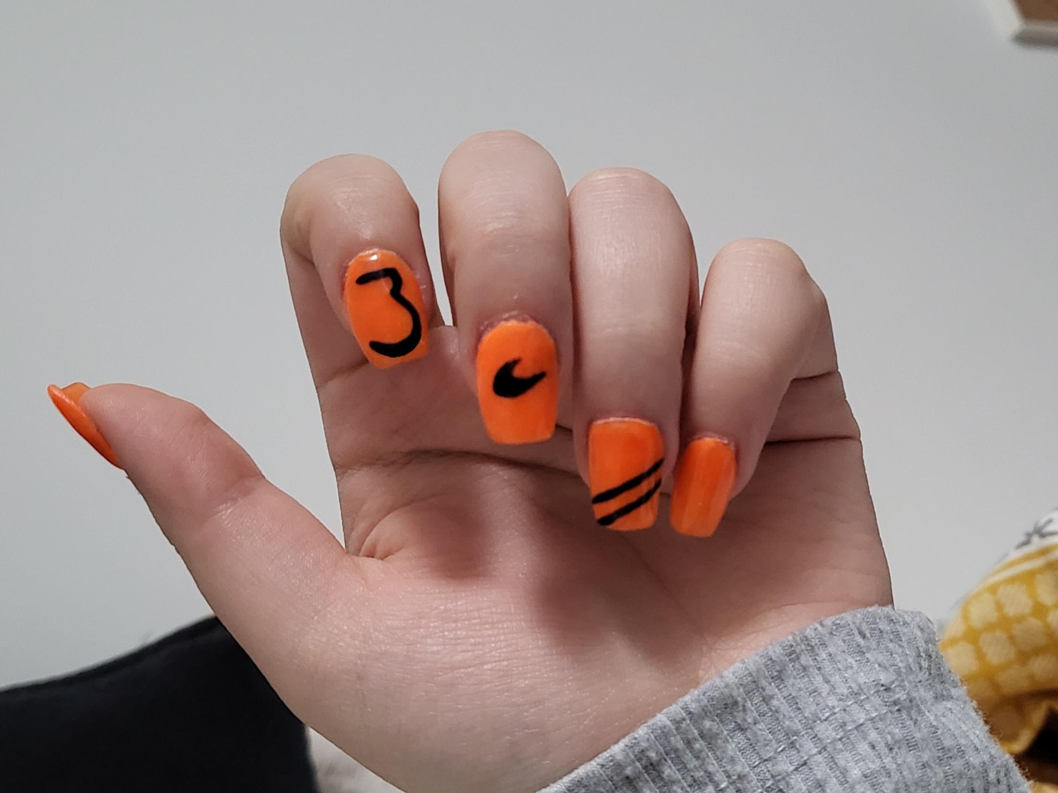 Hand painted McLaren F1 nails by me. r/Nails