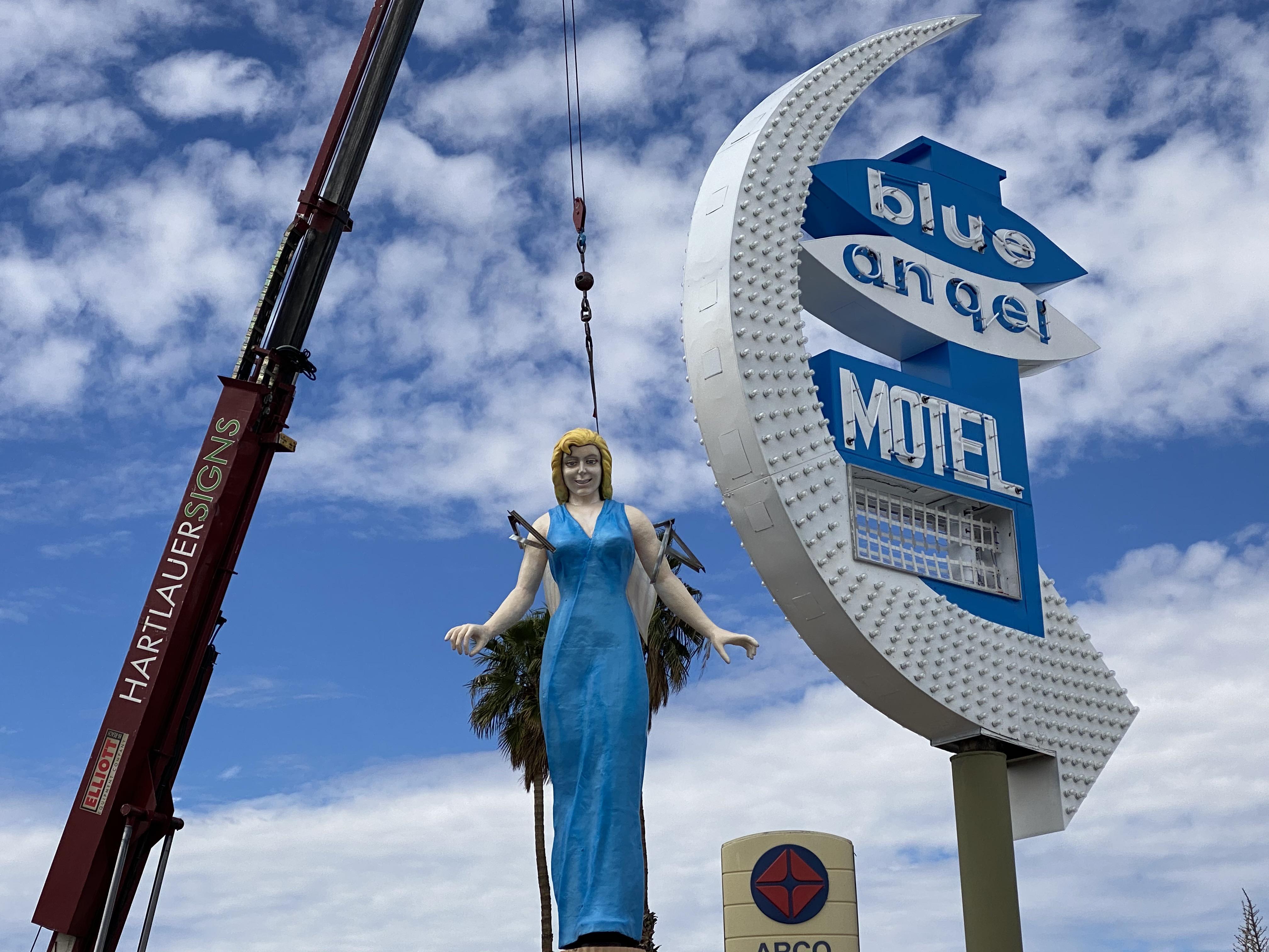 Blue Angel Motel statue and sign being reinstalled today