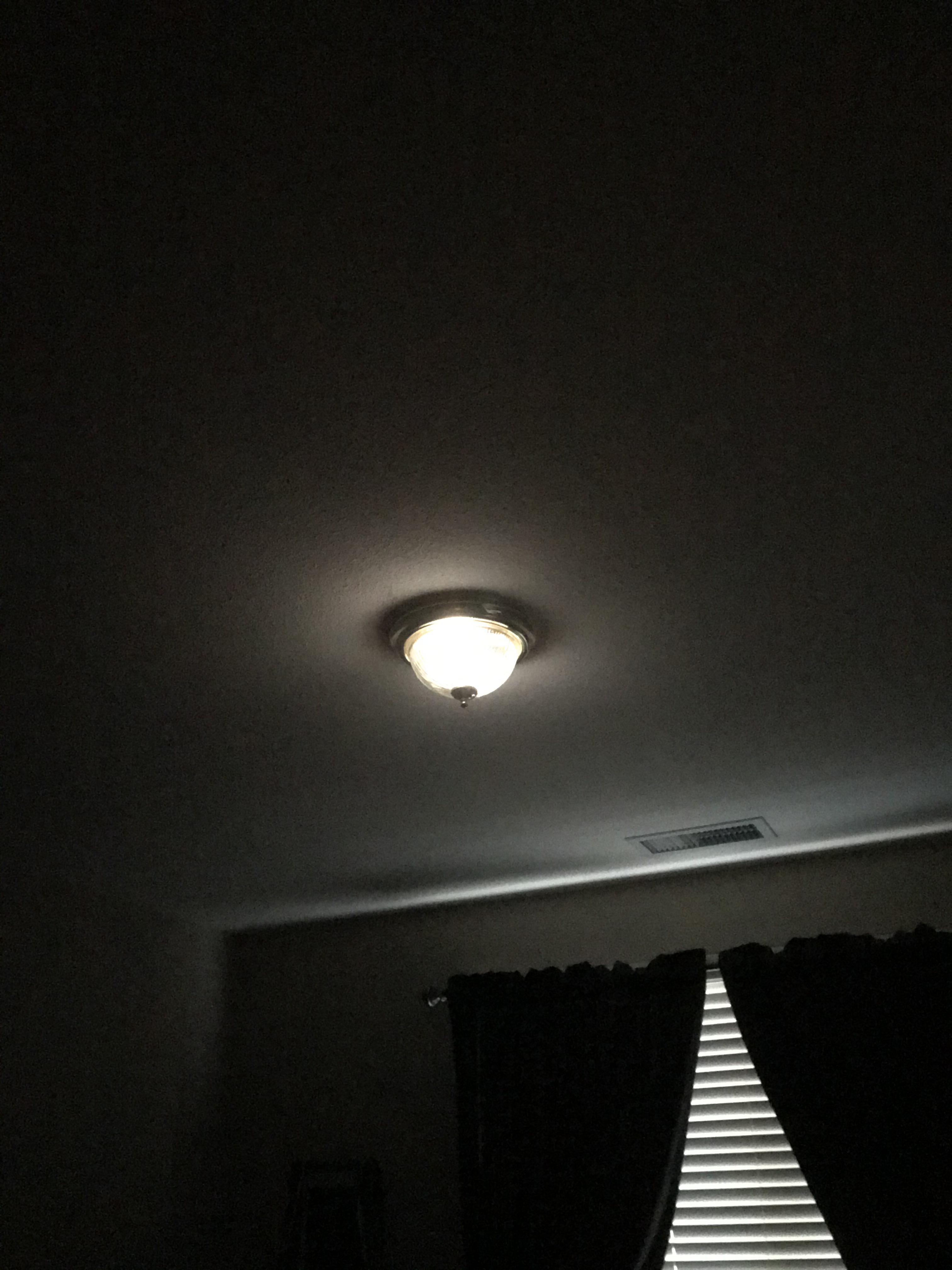 Replaced the light bulbs with dim leds from incandescent. The light fixture has two light bulbs