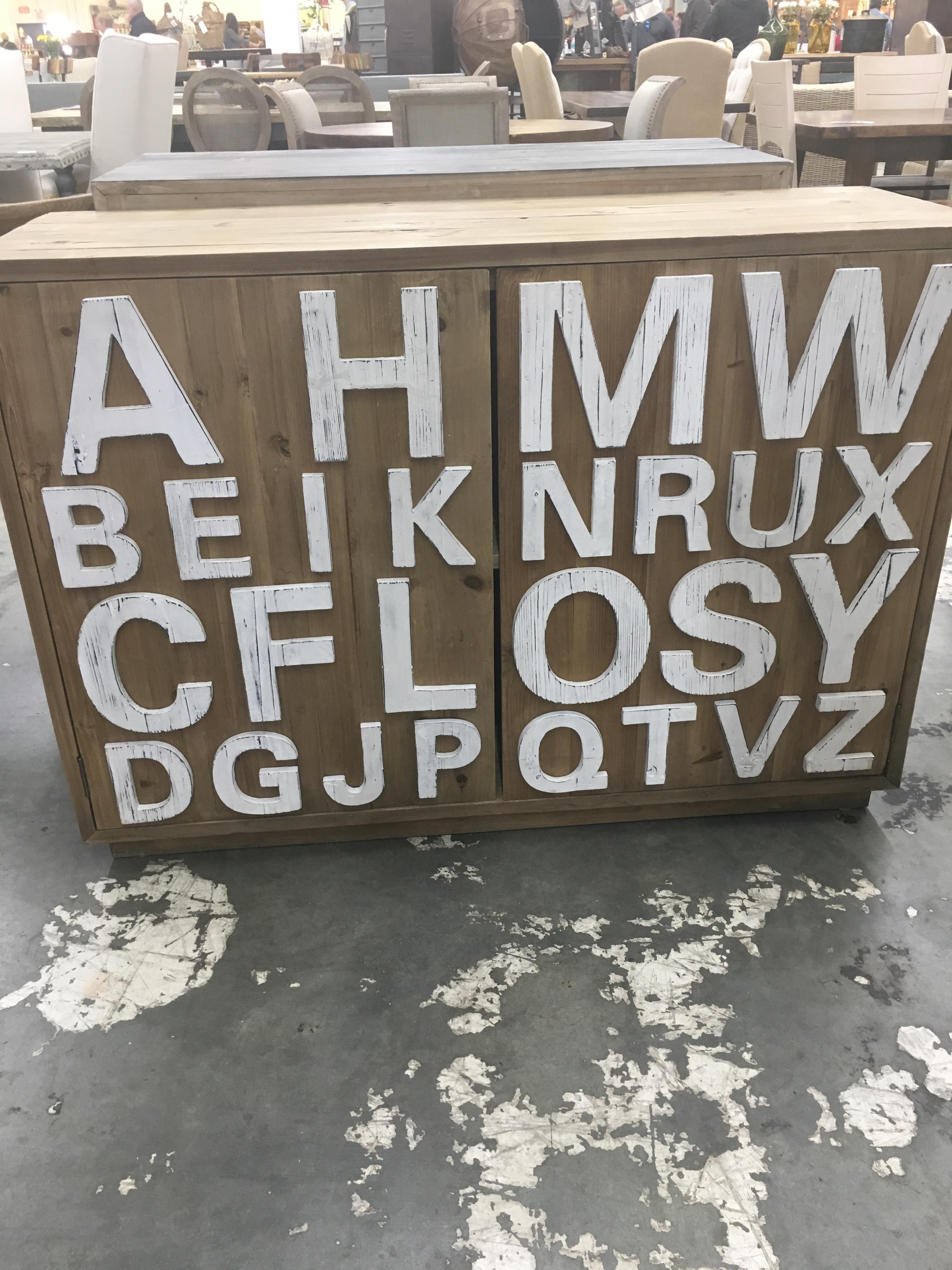 The way the letters are arranged on this piece of furniture r