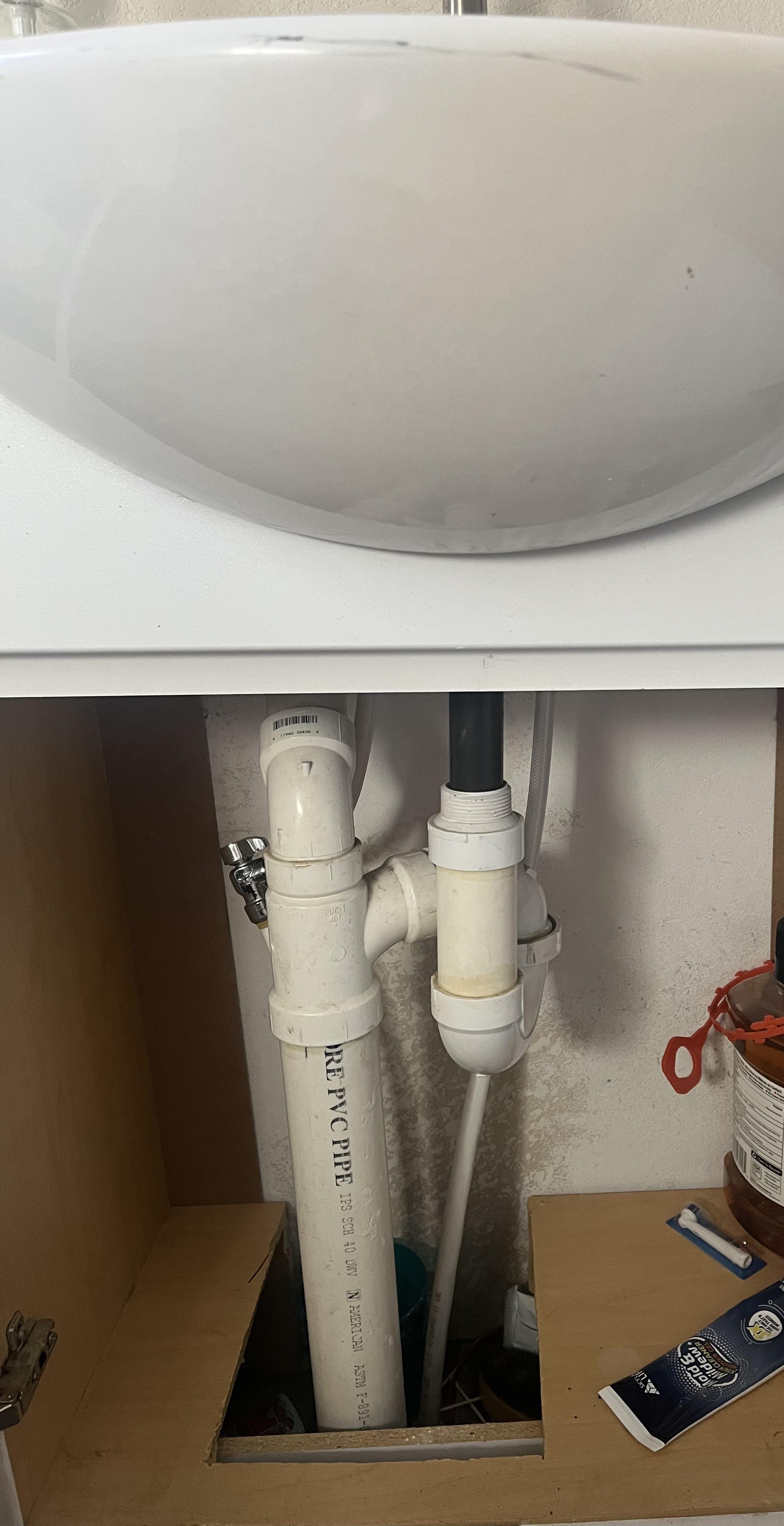 My sink won’t drain. How should I open this to clear it out? r