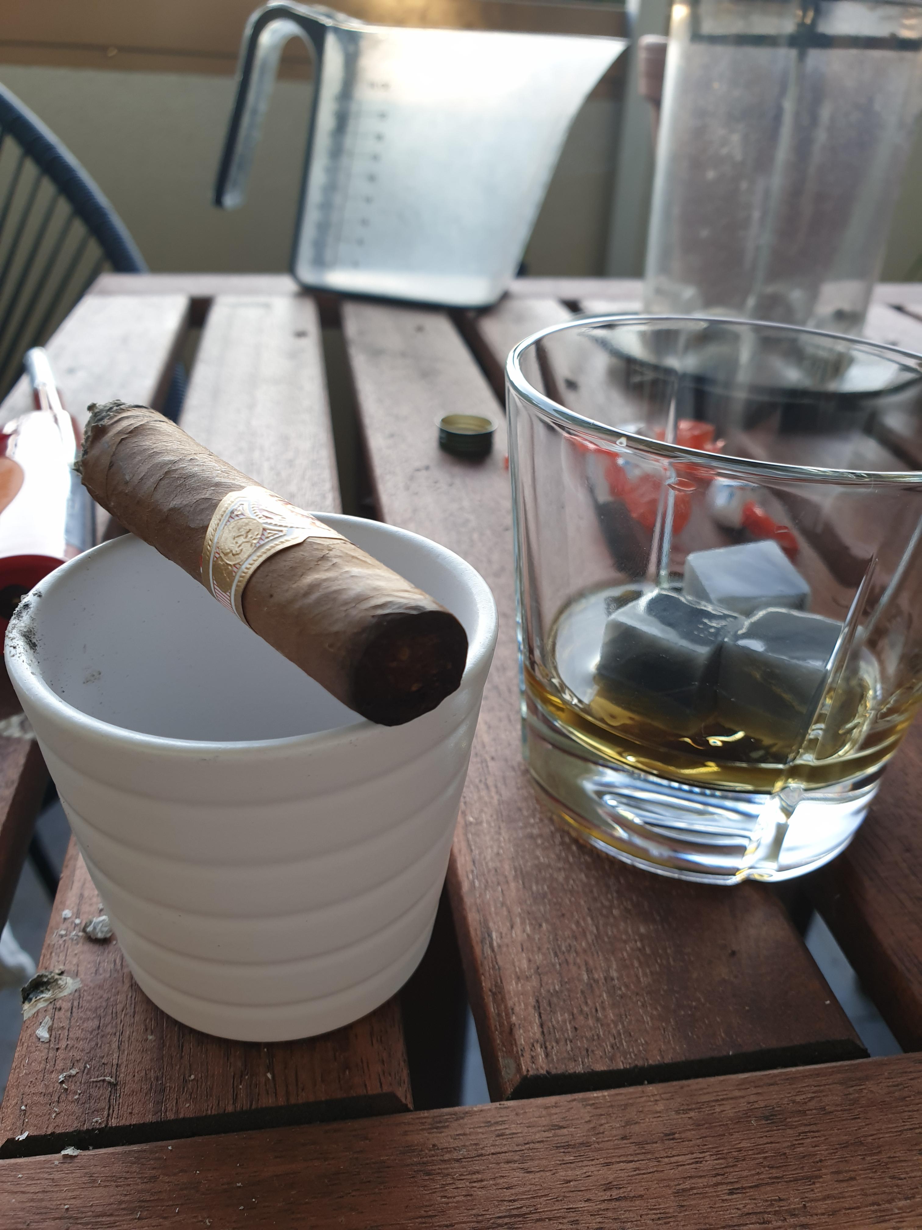 Im new here. Second smoke ever. Its a habana punch with a scotch named monkeys shoulder. r/cigars