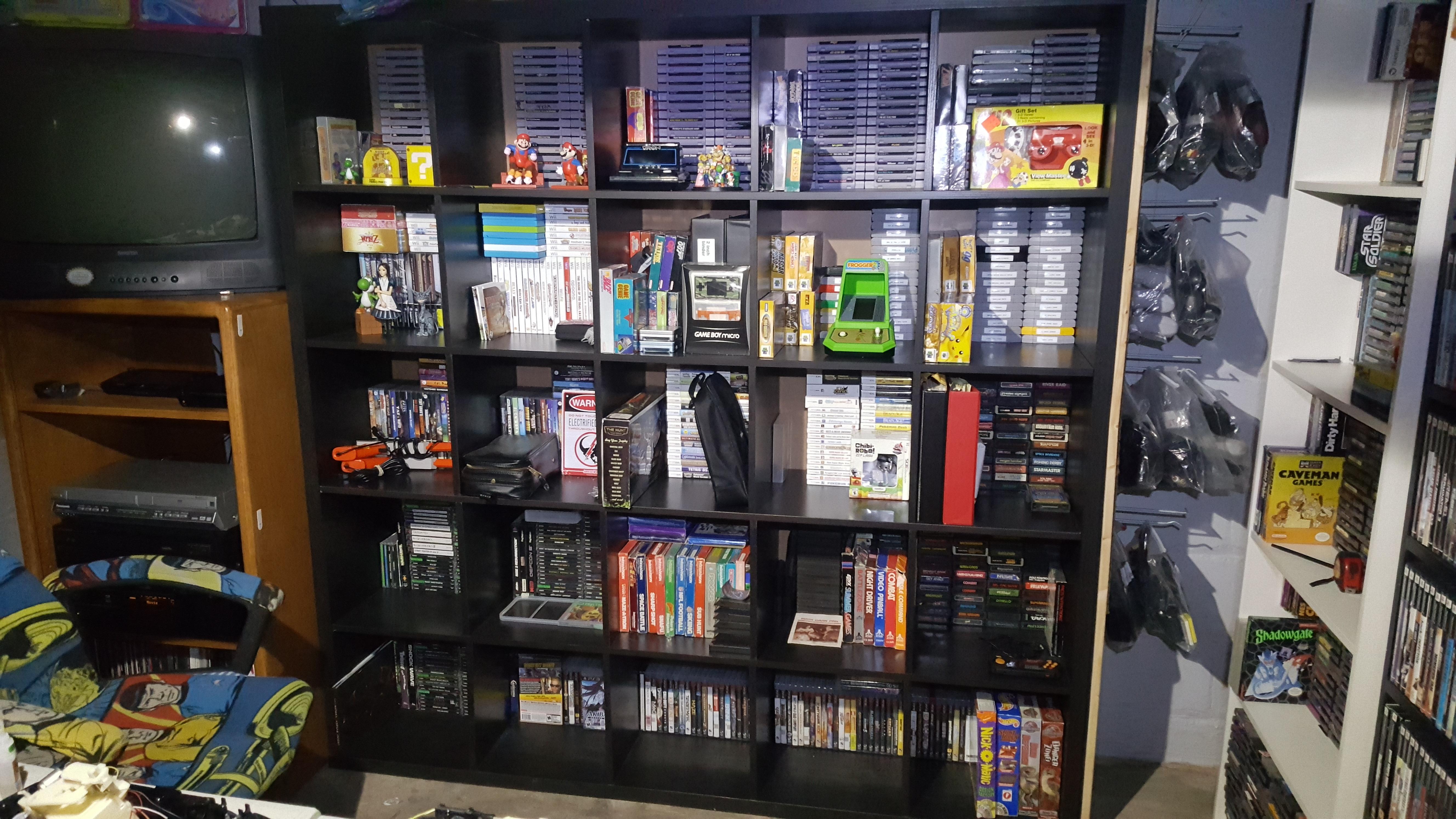 One of my game shelves. r/gamecollecting
