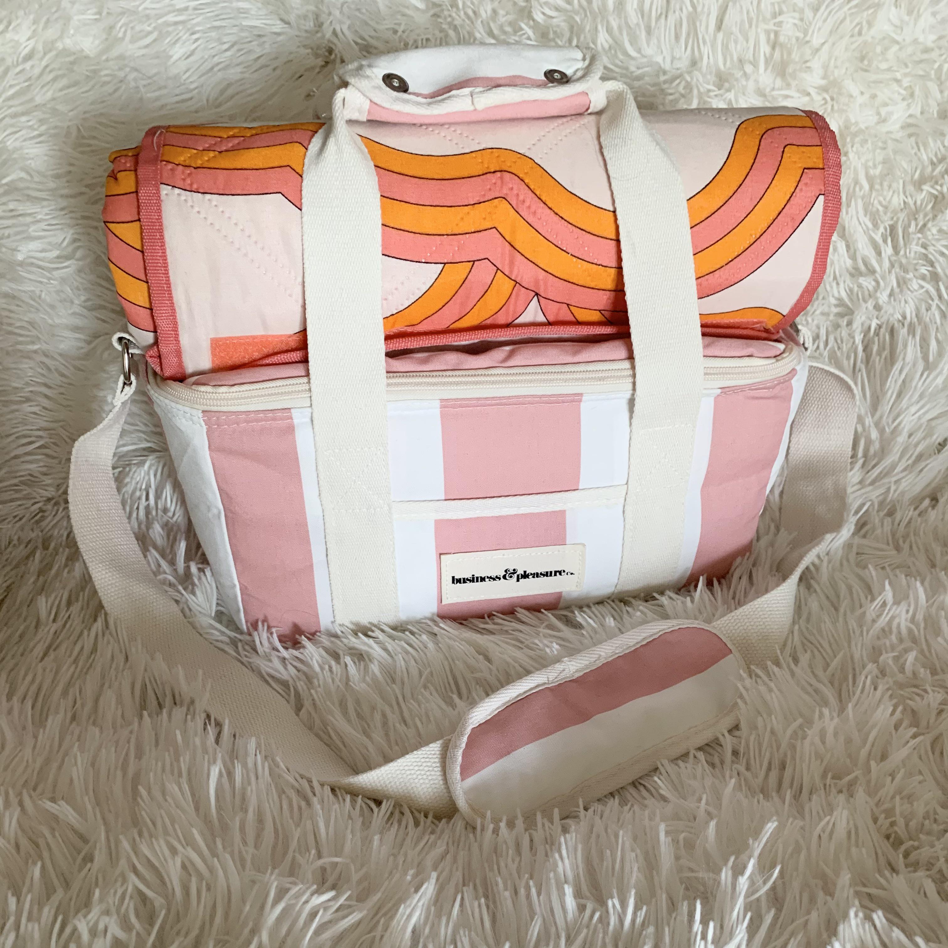 New favorite find. The picnic blanket straps perfectly onto the top of